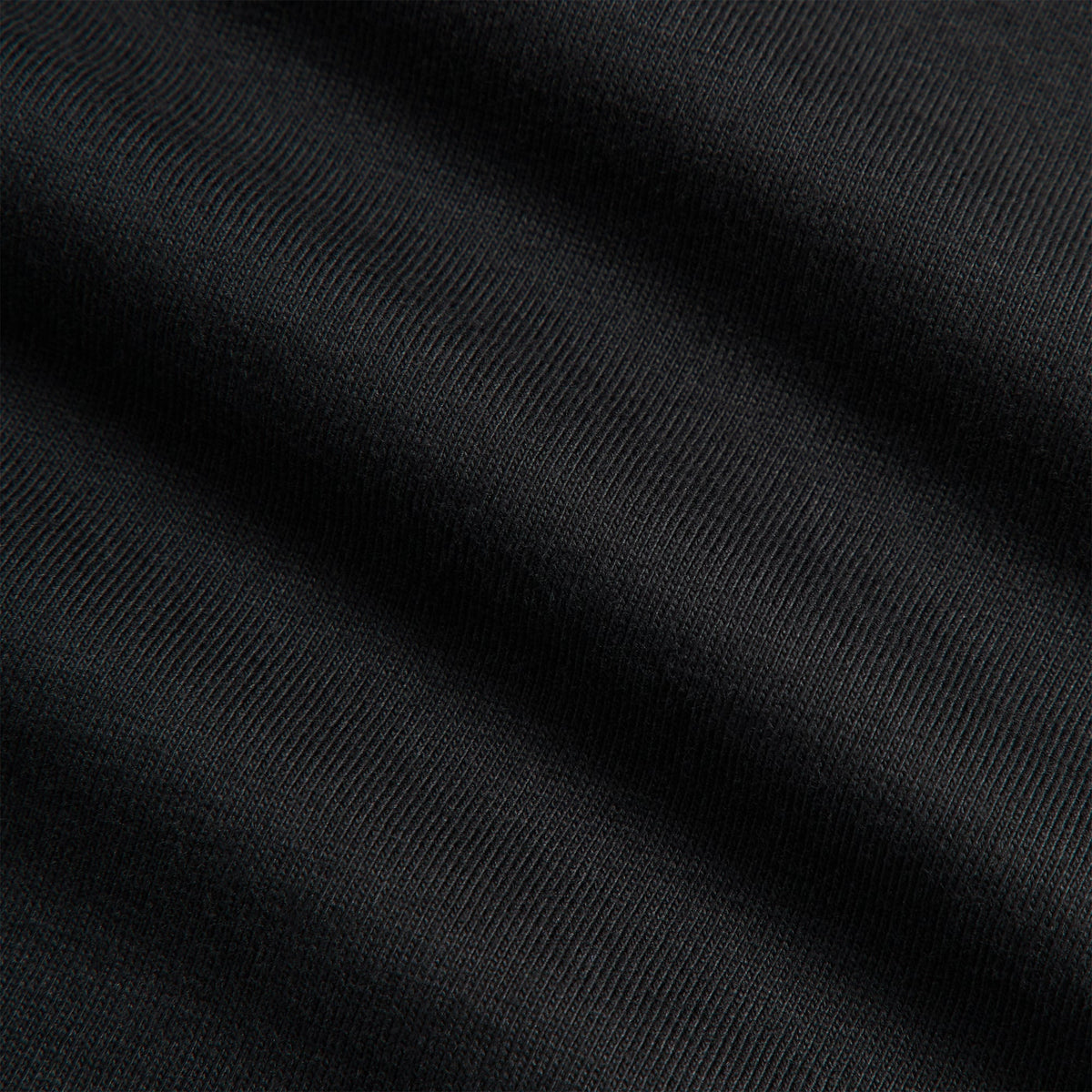 Close-up of black cotton jersey fabric texture, Kith Ivy Tee