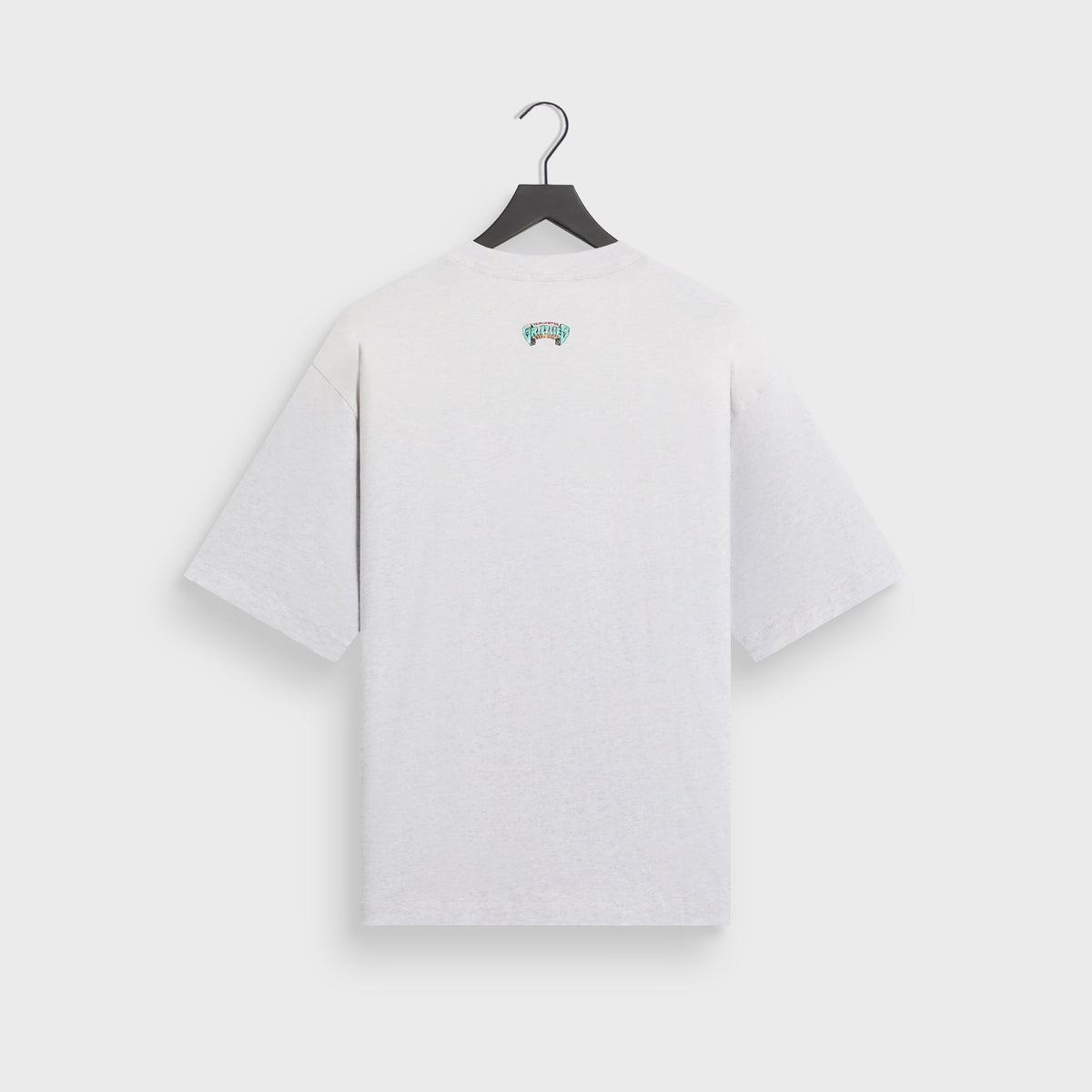 Kith for the Vancouver Grizzlies Vintage Jones II tee in light heather grey on hanger, back view with small teal Grizzlies logo