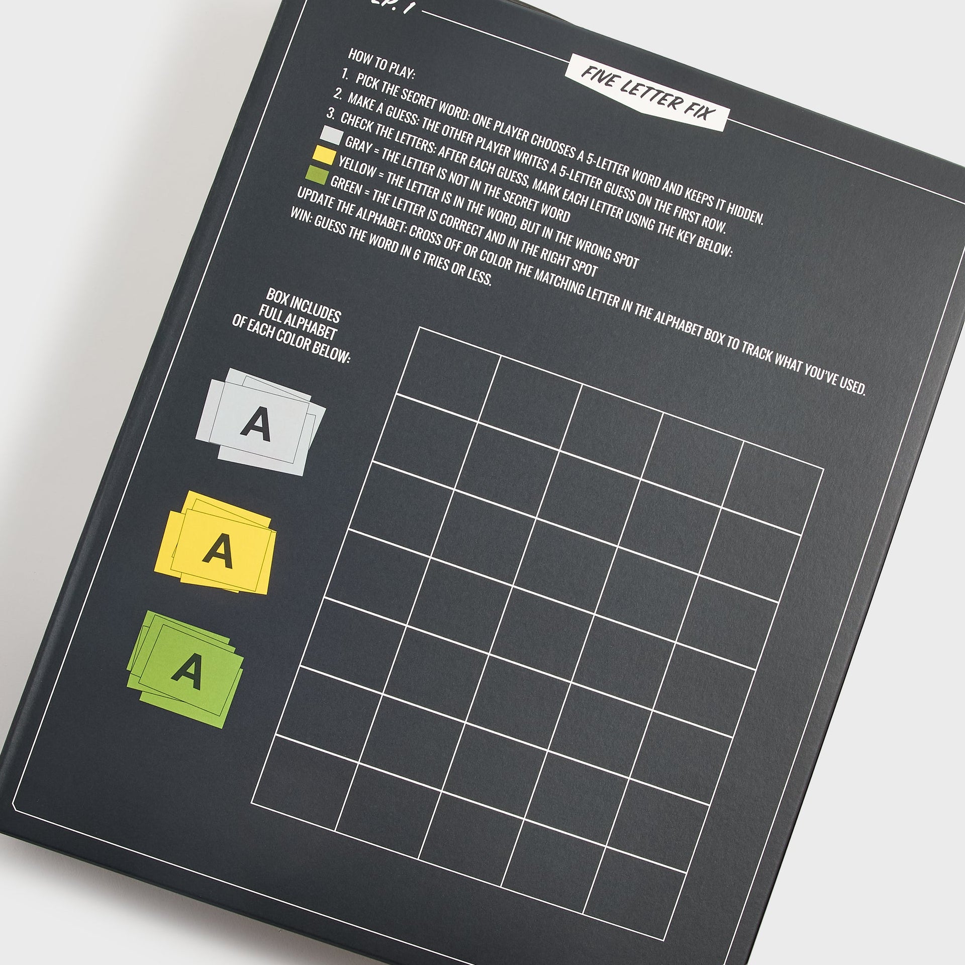 Angled Five Letter Fix game box back showing printed rules and gray, yellow, green alphabet letter tiles