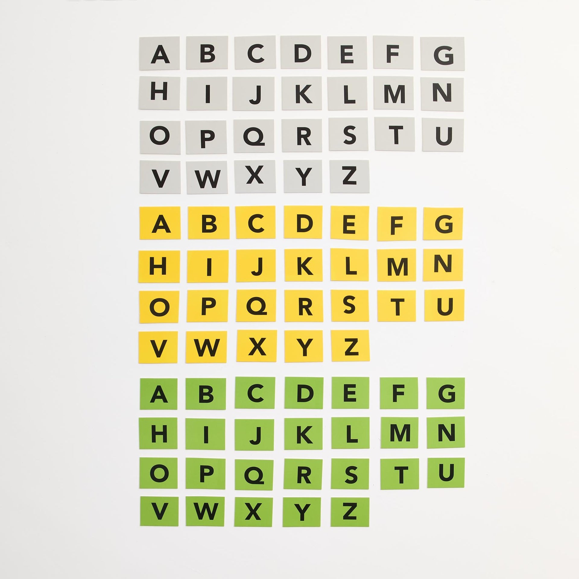 Kith Treats Five Letter Fix letter tiles arranged in full gray, yellow and green alphabets on white