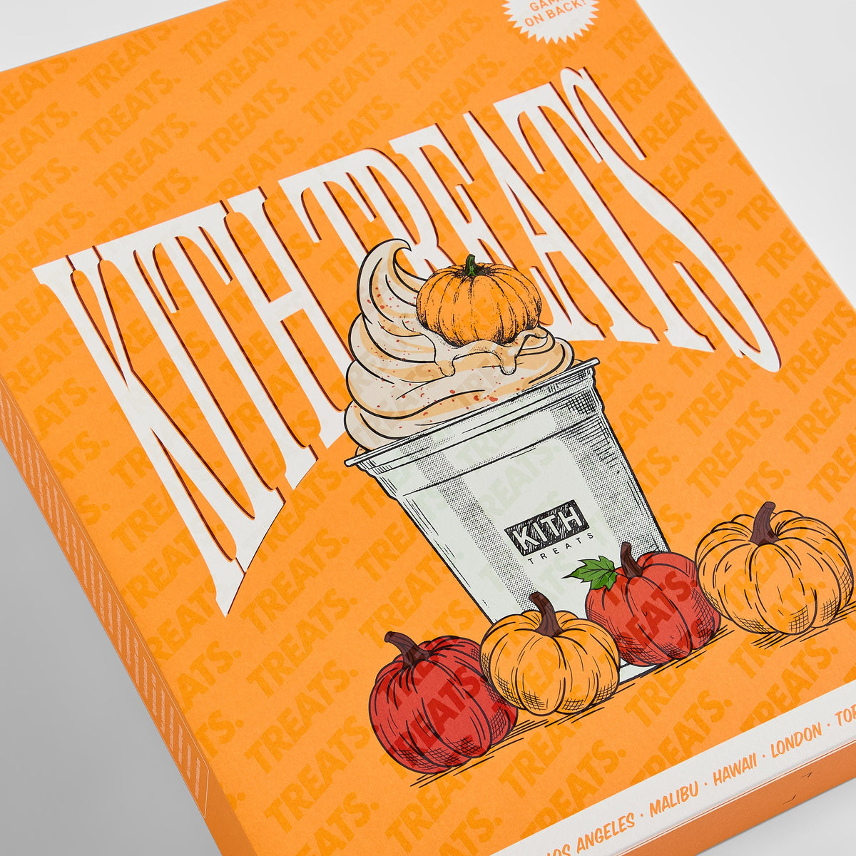 Angled close-up of Kith Treats Pumpkin Harvest box front with Kith Treats lettering, soft-serve cup and pumpkins, Nelson Crewneck set