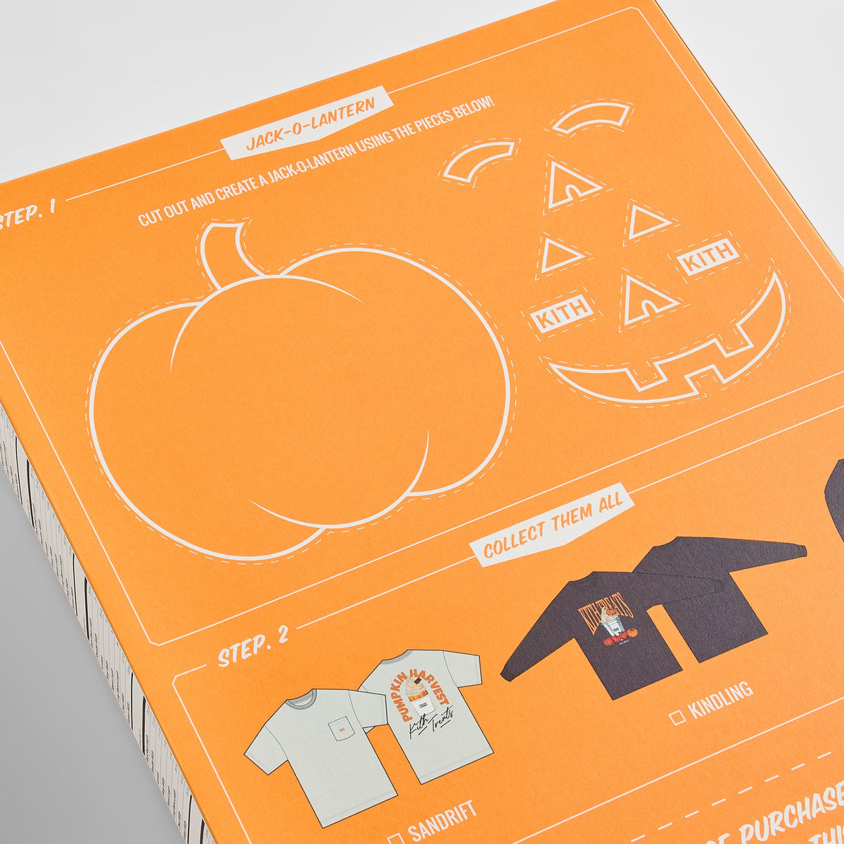 Close-up of Kith Treats Pumpkin Harvest box back with jack-o'-lantern cut-out pieces and Sandrift and Kindling apparel checklist, crewneck set
