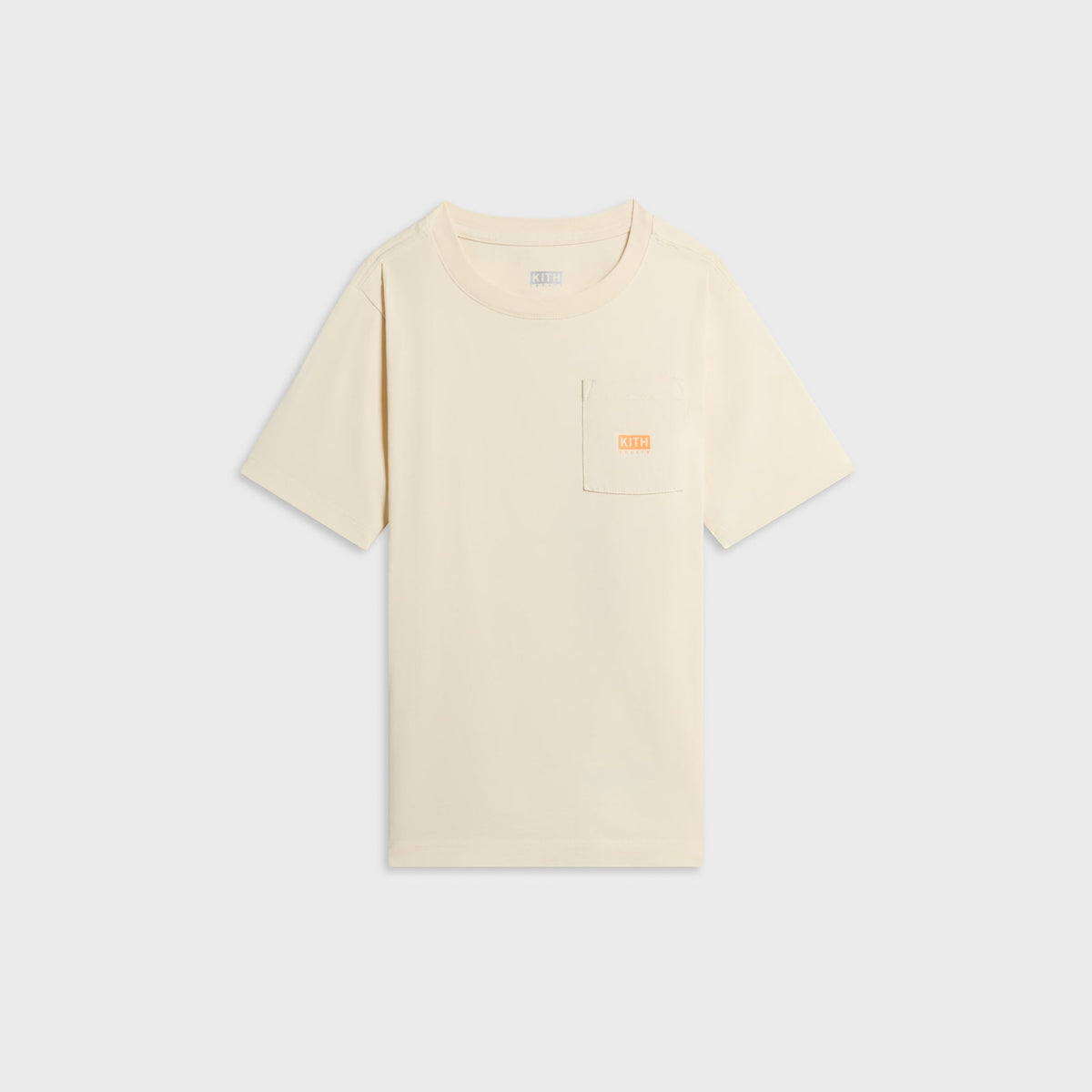 Kith Kids Treats Pumpkin Harvest Pocket Tee in Sandrift cream, front view with small orange Kith Treats pocket logo