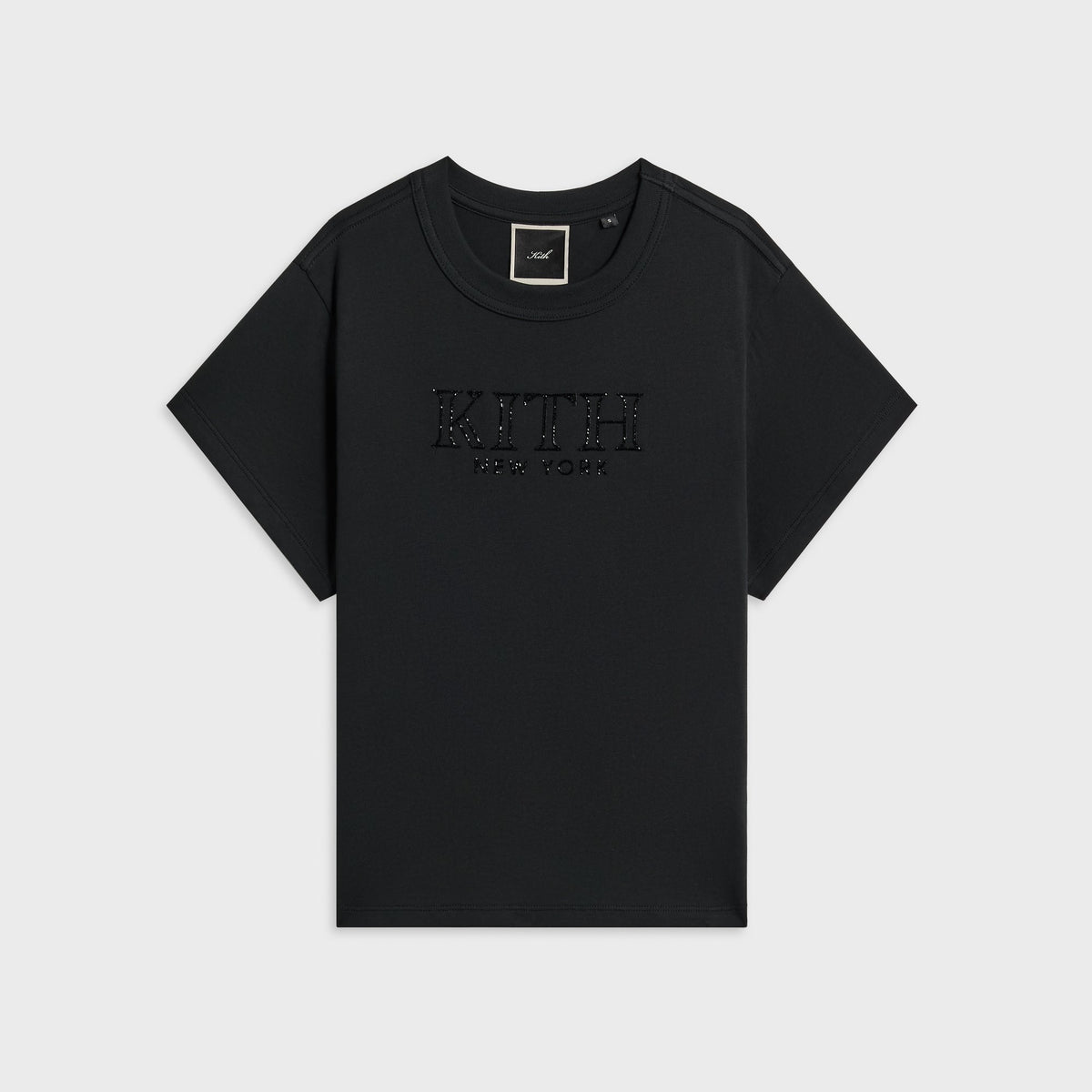 Kith Women Mulberry vintage tee in black with crystal Serif Kith New York logo at chest, front flat-lay
