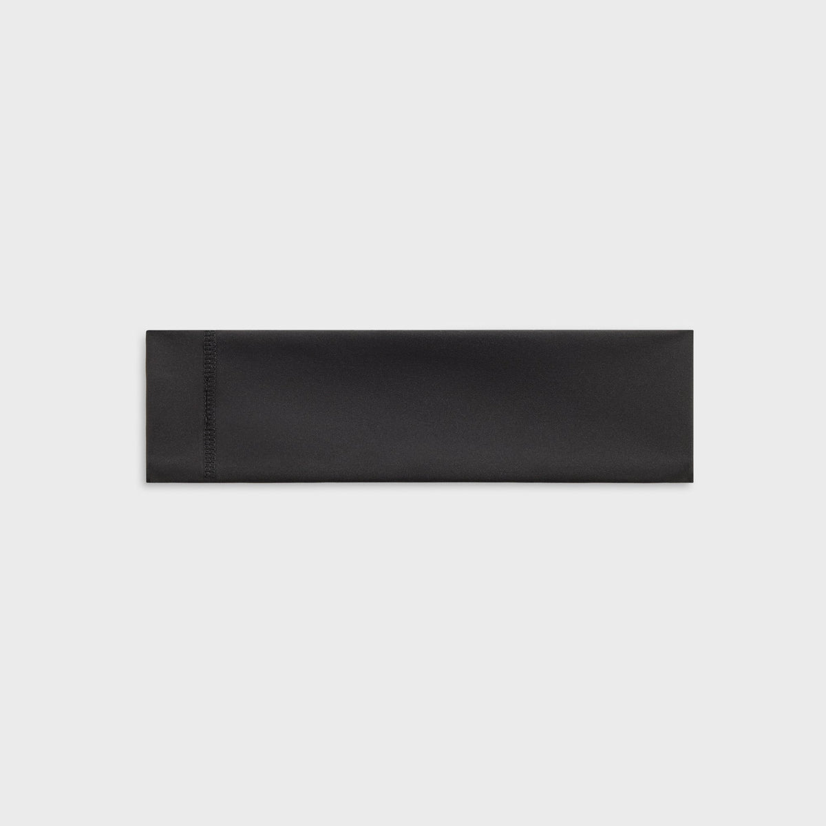 Kith Women's Active Headband in black, folded flat lay showing seam construction
