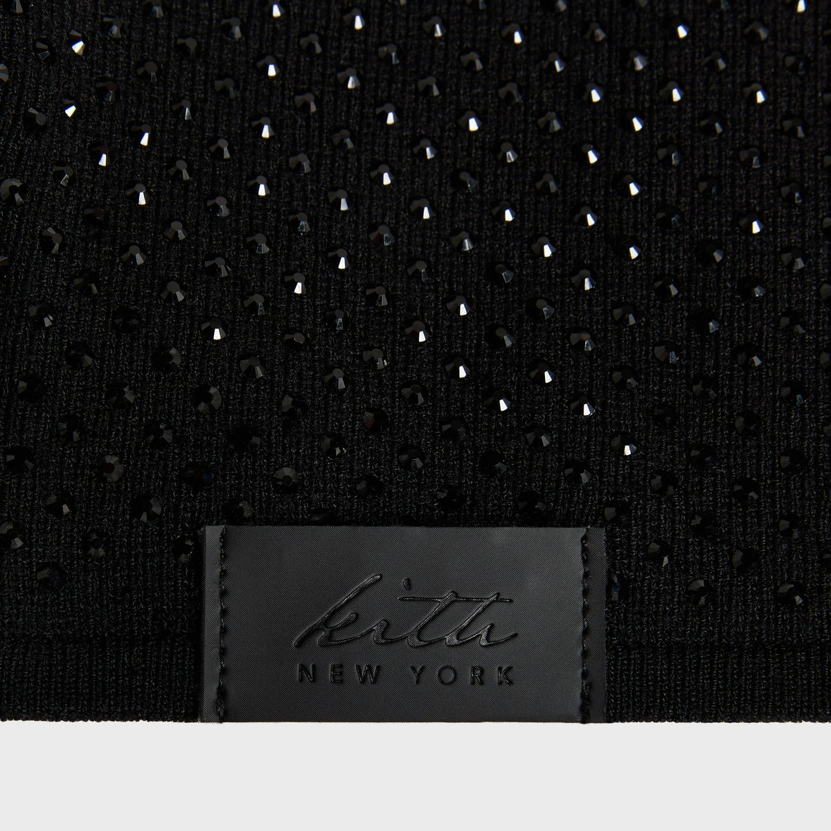Close-up of the crystal rhinestone knit and Kith New York tag on the Encrusted fitted balaclava