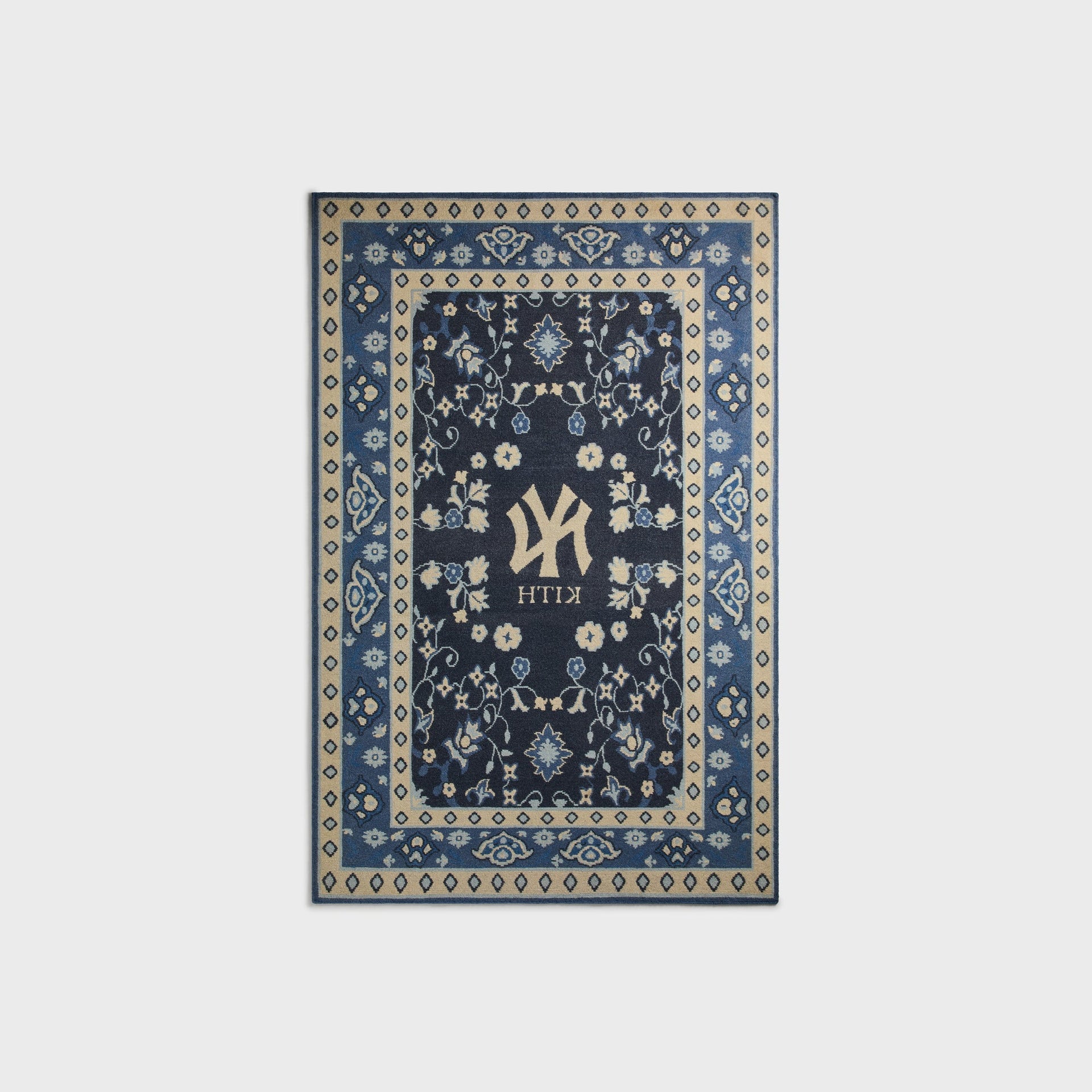 Kith & Kasra Rugs NY Yankees 4x6 rug in Nocturnal, reverse-side view showing mirrored Yankees logo and KITH text