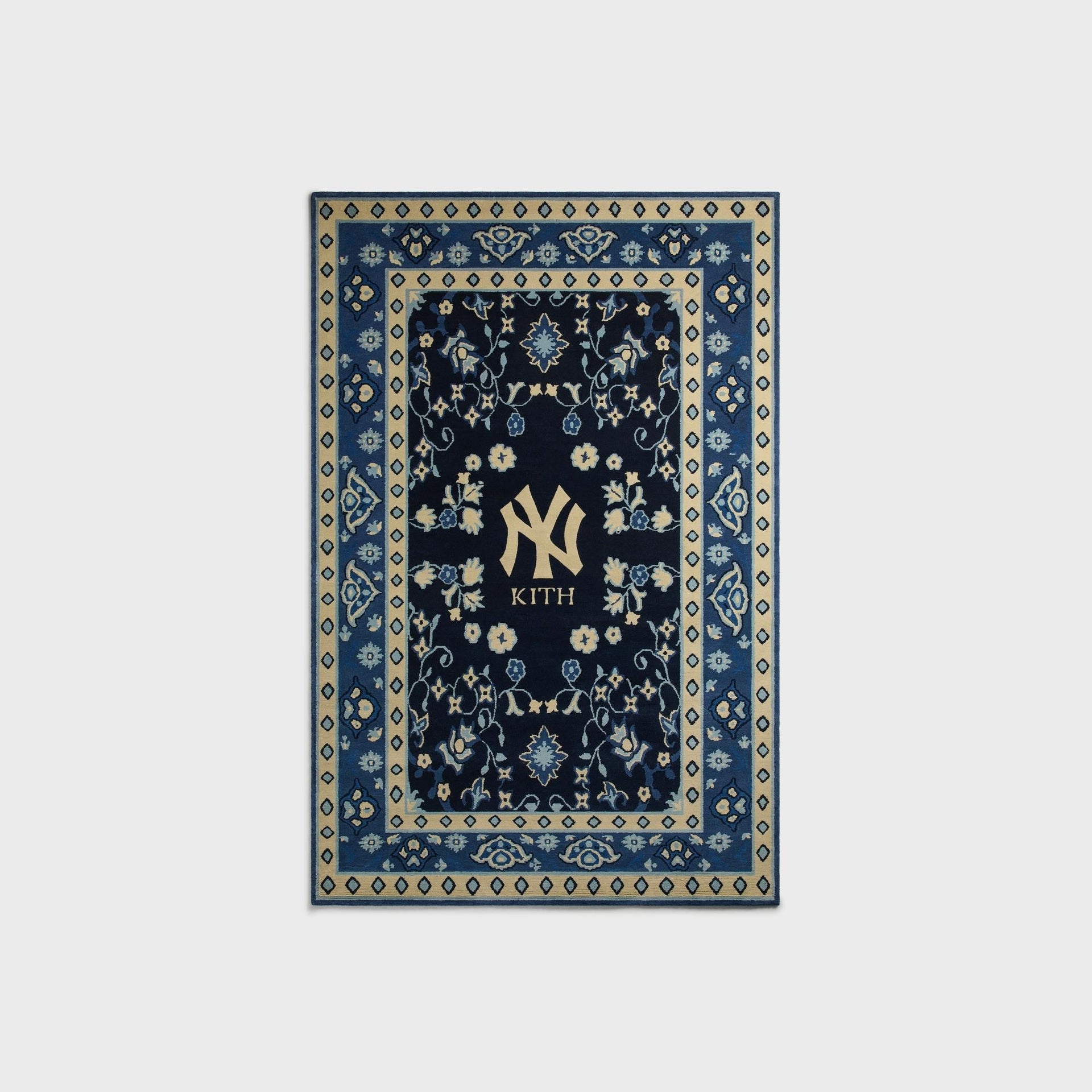 Kith & Kasra Rugs NY Yankees 4x6 hand-knotted rug in Nocturnal navy, front view with cream diamond border
