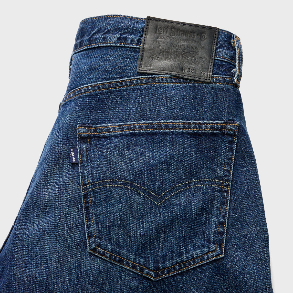 Levi's Blue Tab Anchor Jean in Wright dark wash, close-up of back pocket, arcuate stitching and leather patch
