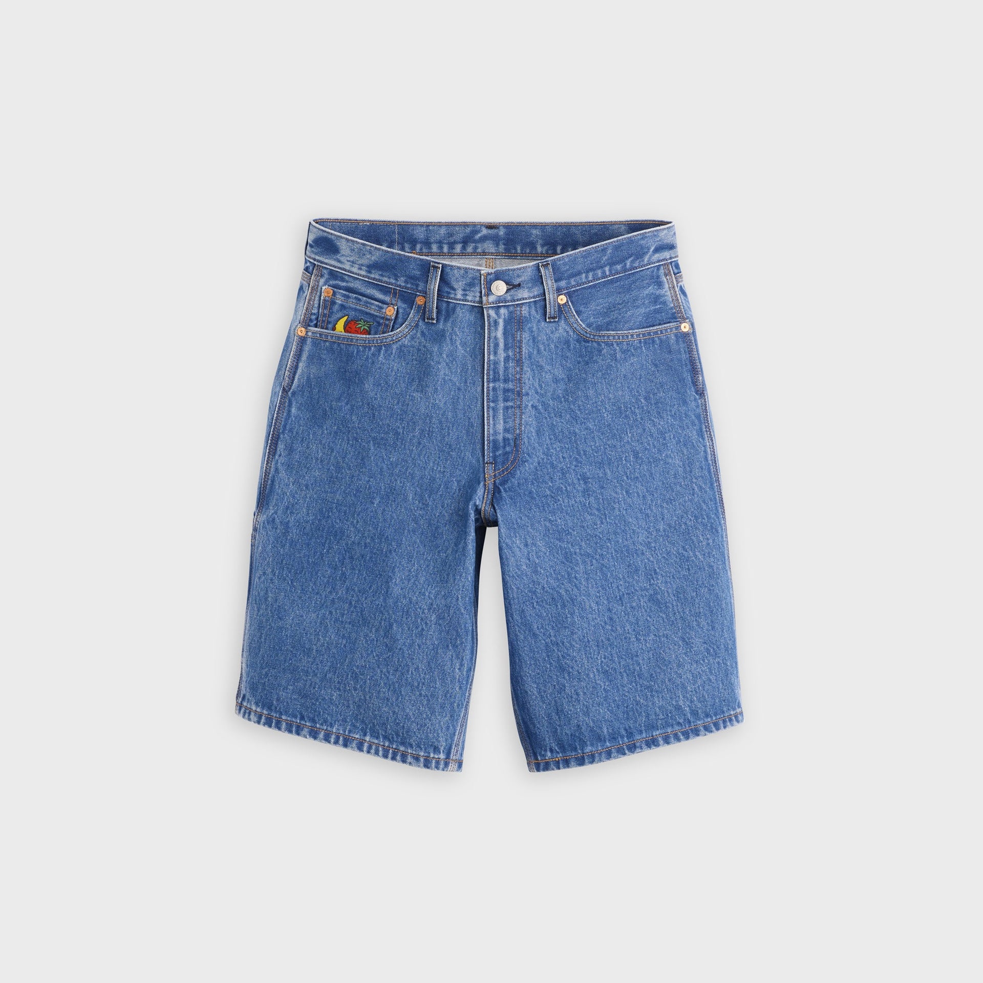 Levi's x Sky High Farm Goods mid-indigo baggy utility denim shorts, front view with embroidered banana-and-strawberry mascot on the coin pocket