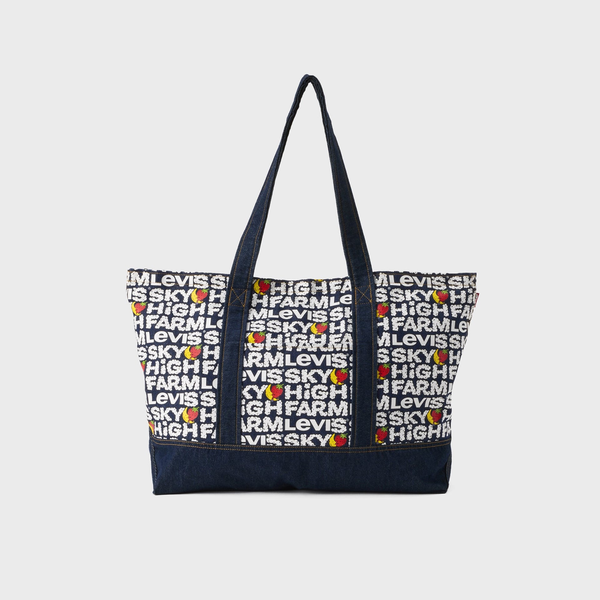 Back view of Levi's x Sky High Farm garden tote bag with all-over 'Sky High Farm Levi's' text print and dark denim base and handles