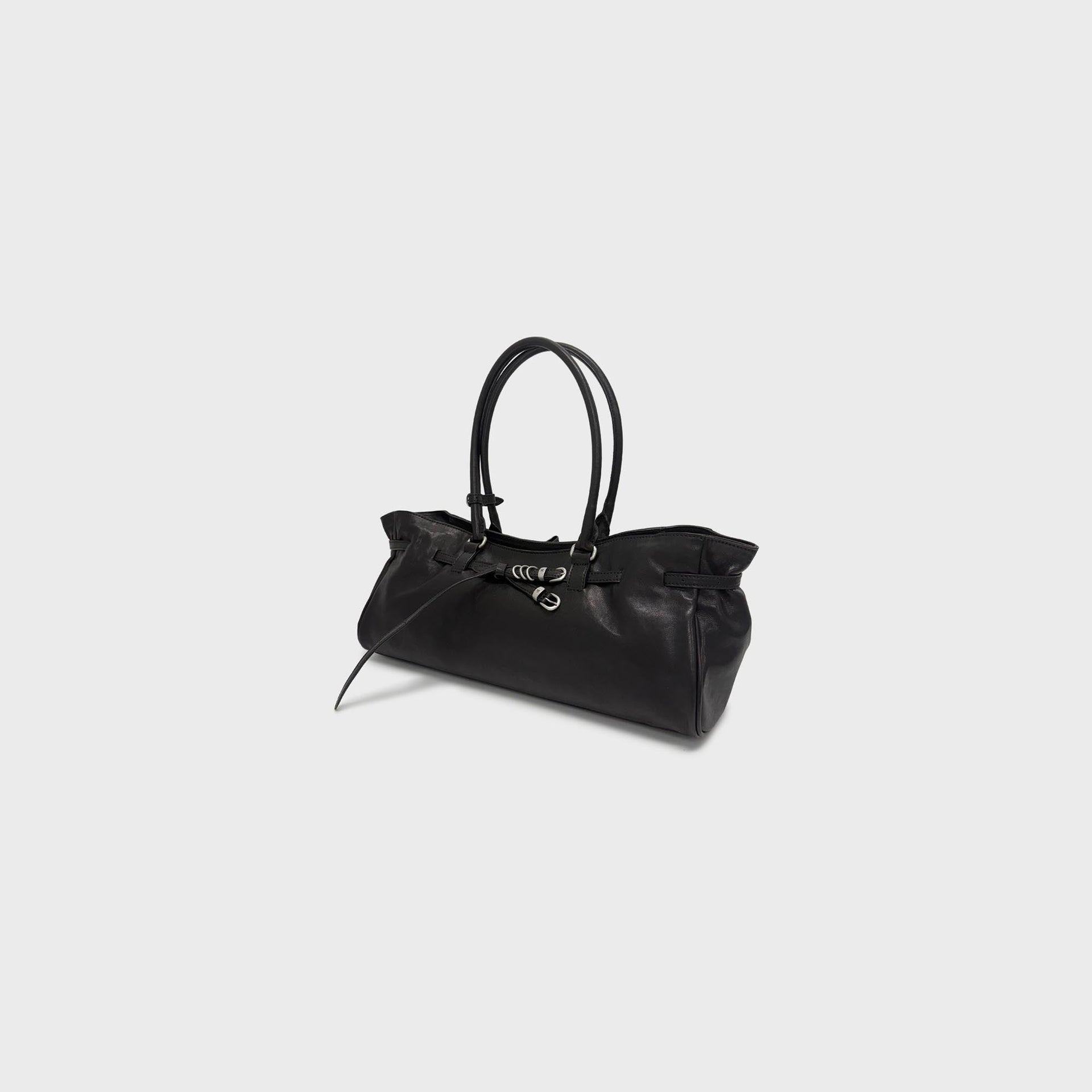 MARGESHERWOOD black pull-up leather Grandma bag, three-quarter view with slouchy body and dual handles