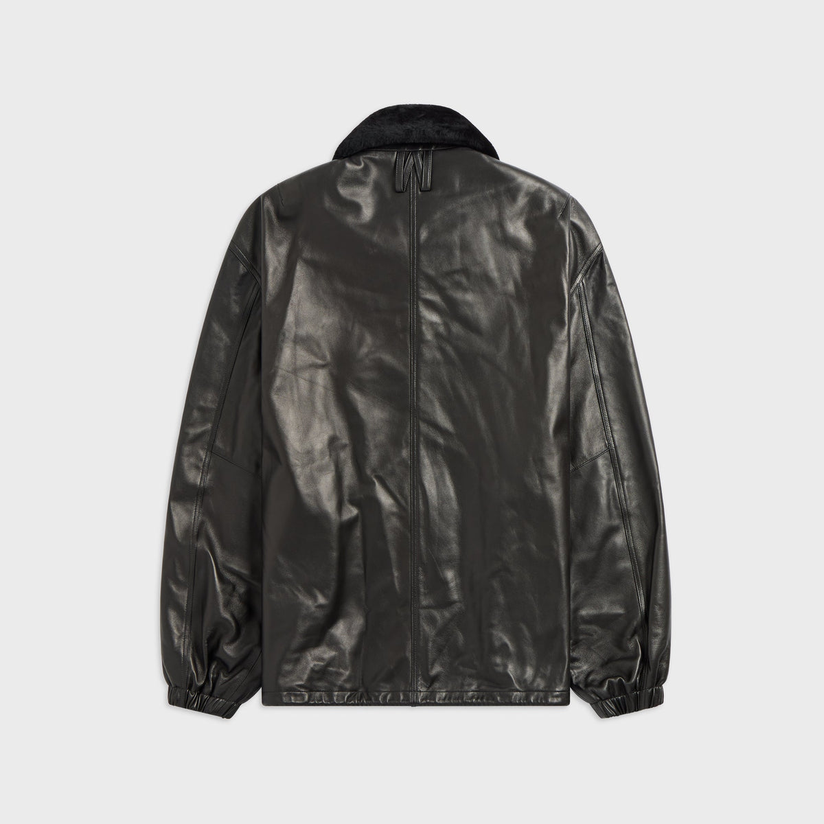Willy Chavarria Leather Coach Jacket in black, back view, smooth leather with elasticated hem