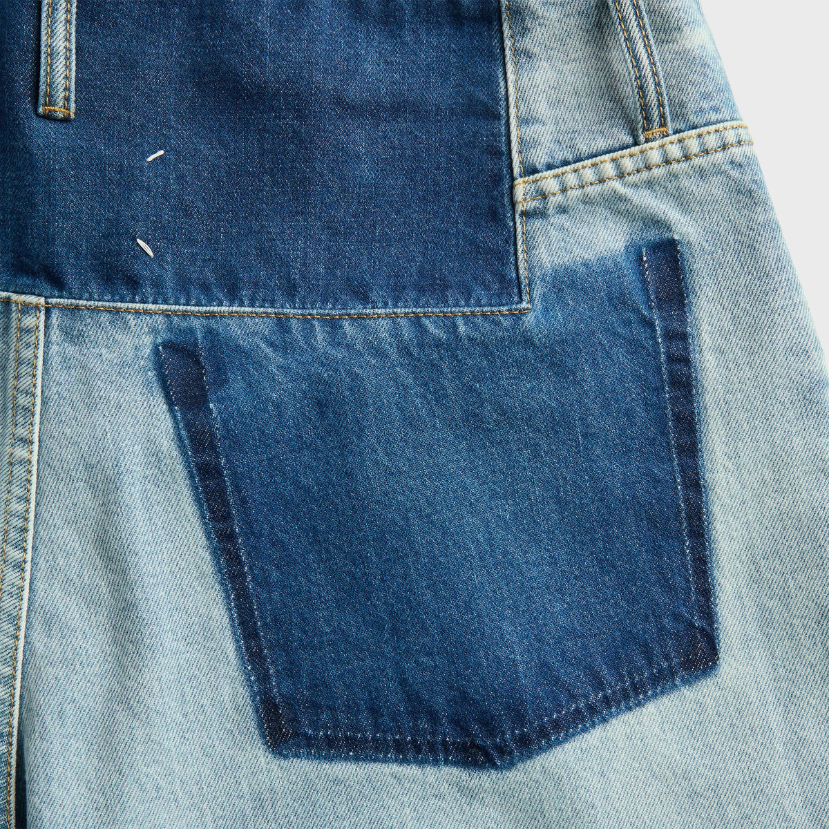 Maison Margiela Straight Leg Jean in Blue, close-up of the contrast dark denim back pocket and yoke