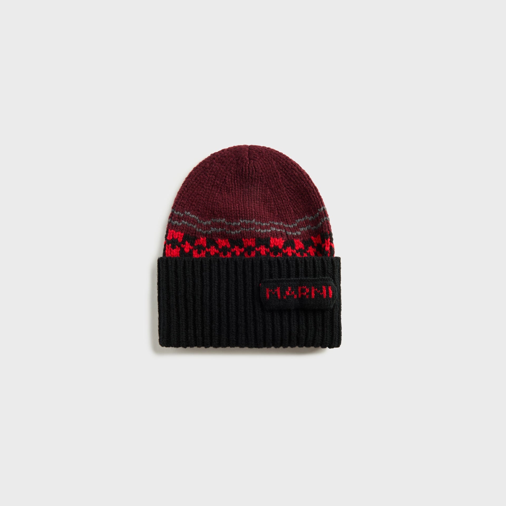 Marni knit wool beanie in burgundy with black ribbed cuff and red fair isle pattern band, front view