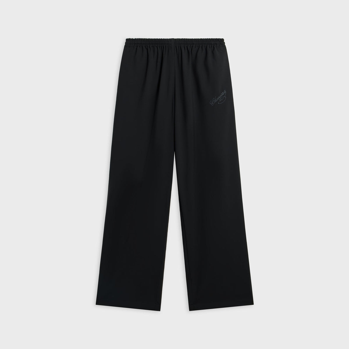 Willy Chavarria Ruff Rider Track Pant in Black Beauty, black wide-leg elastic-waist pant with tonal logo, front view