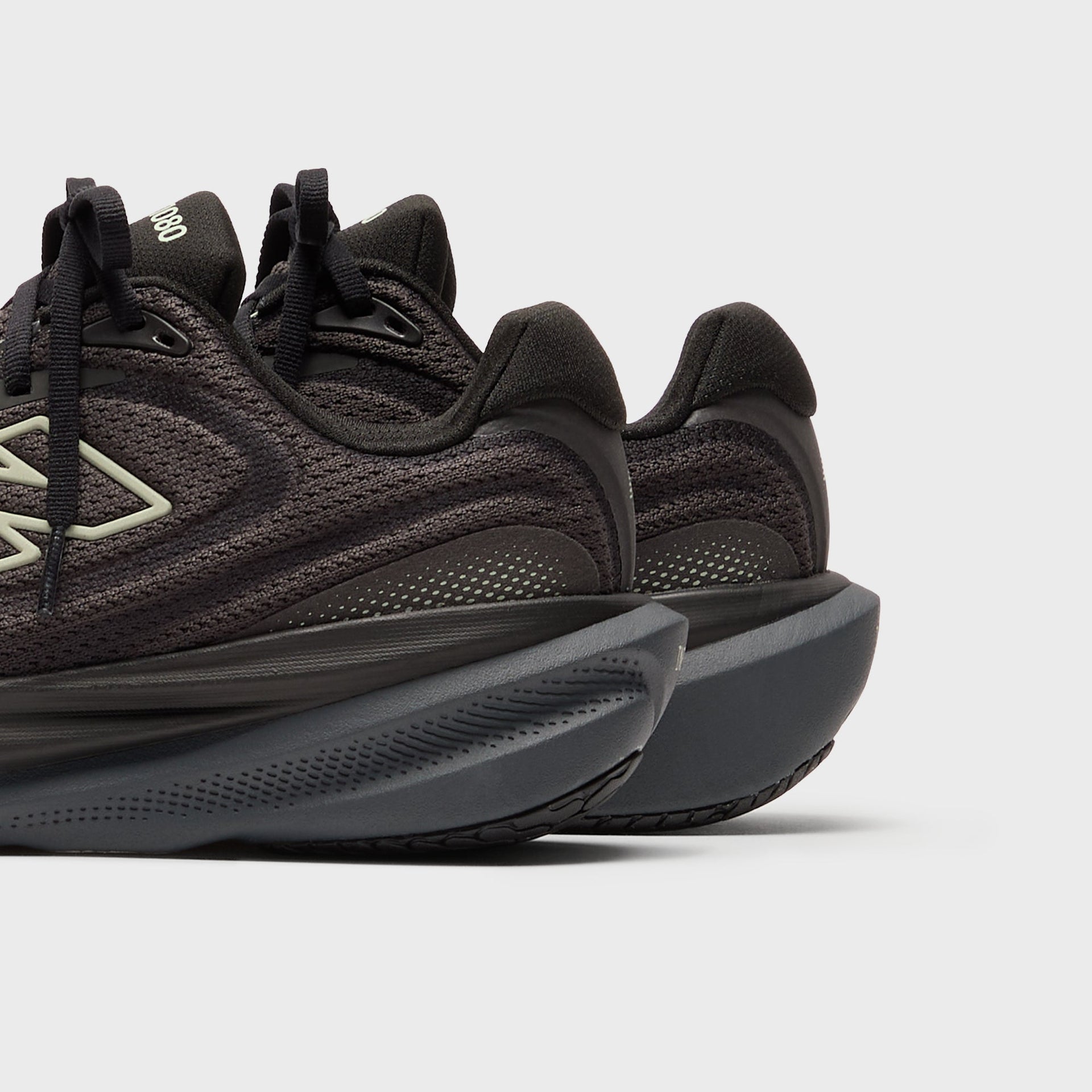 New Balance 1080v15 - Black / Faded Black / Olivine