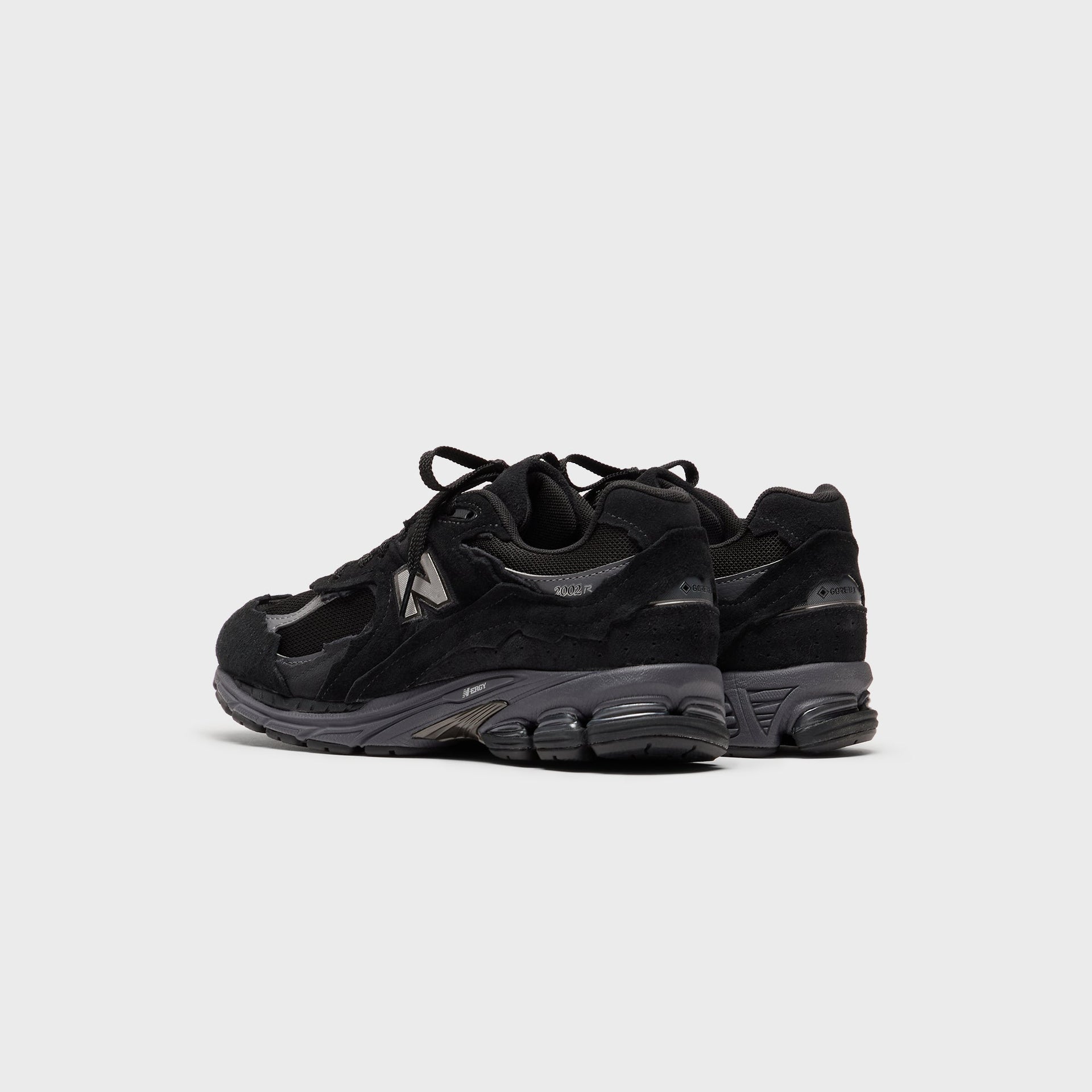 New Balance U2002DX - Black / Magnet