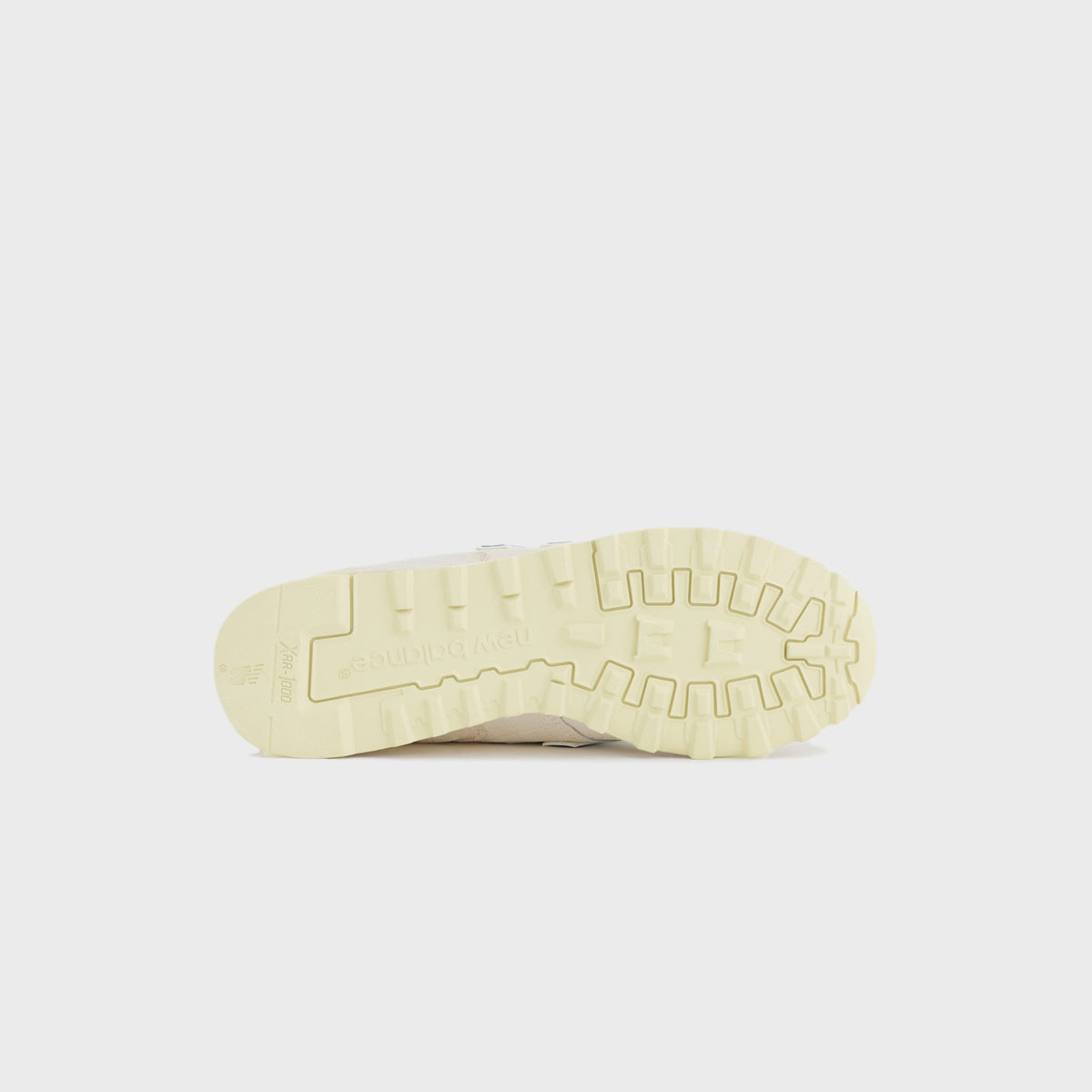 New Balance Made in USA 1300 outsole in cream, close-up of the XAR-1000 tread pattern