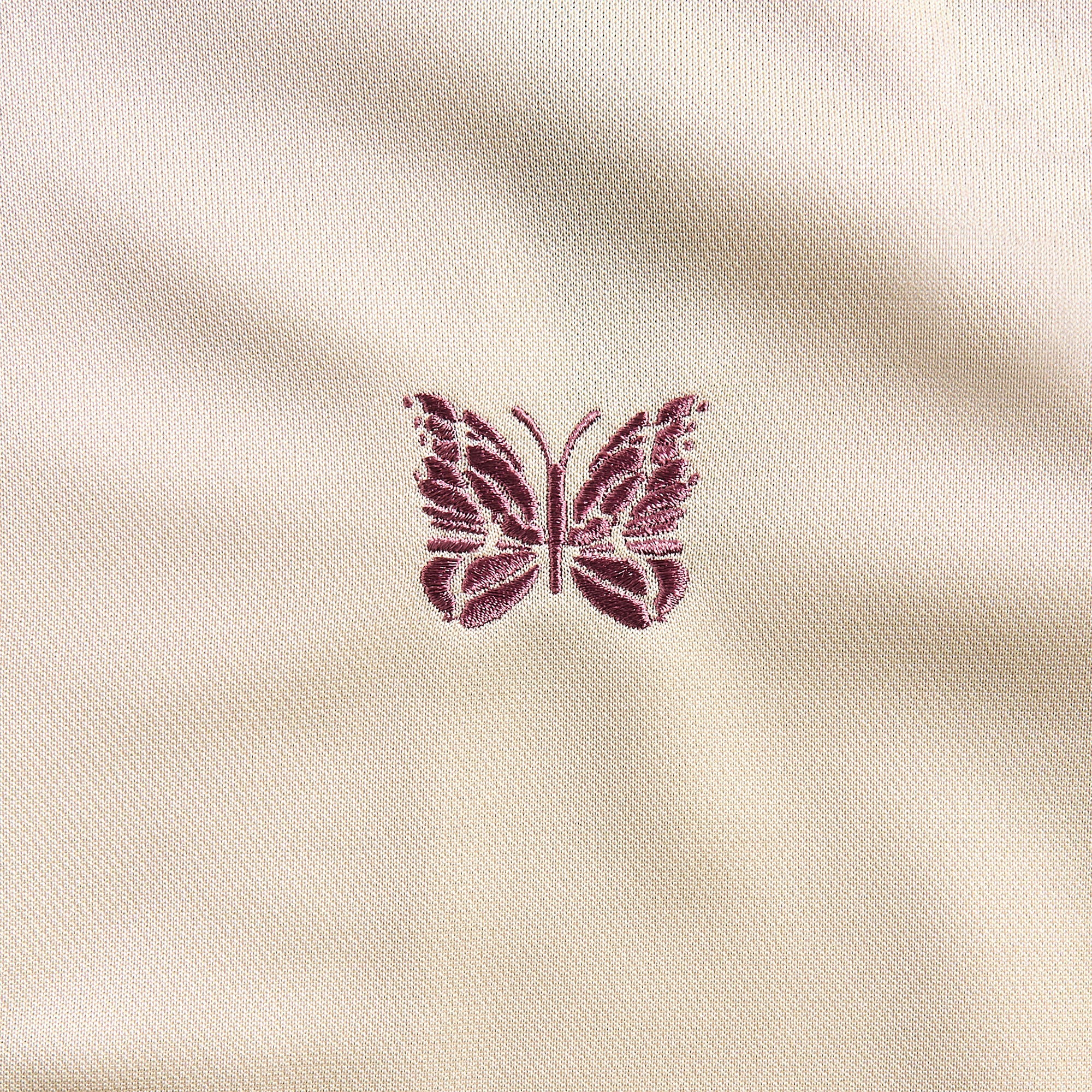DHgate.com:Purple Butterfly Embroidery Logo Needles Track