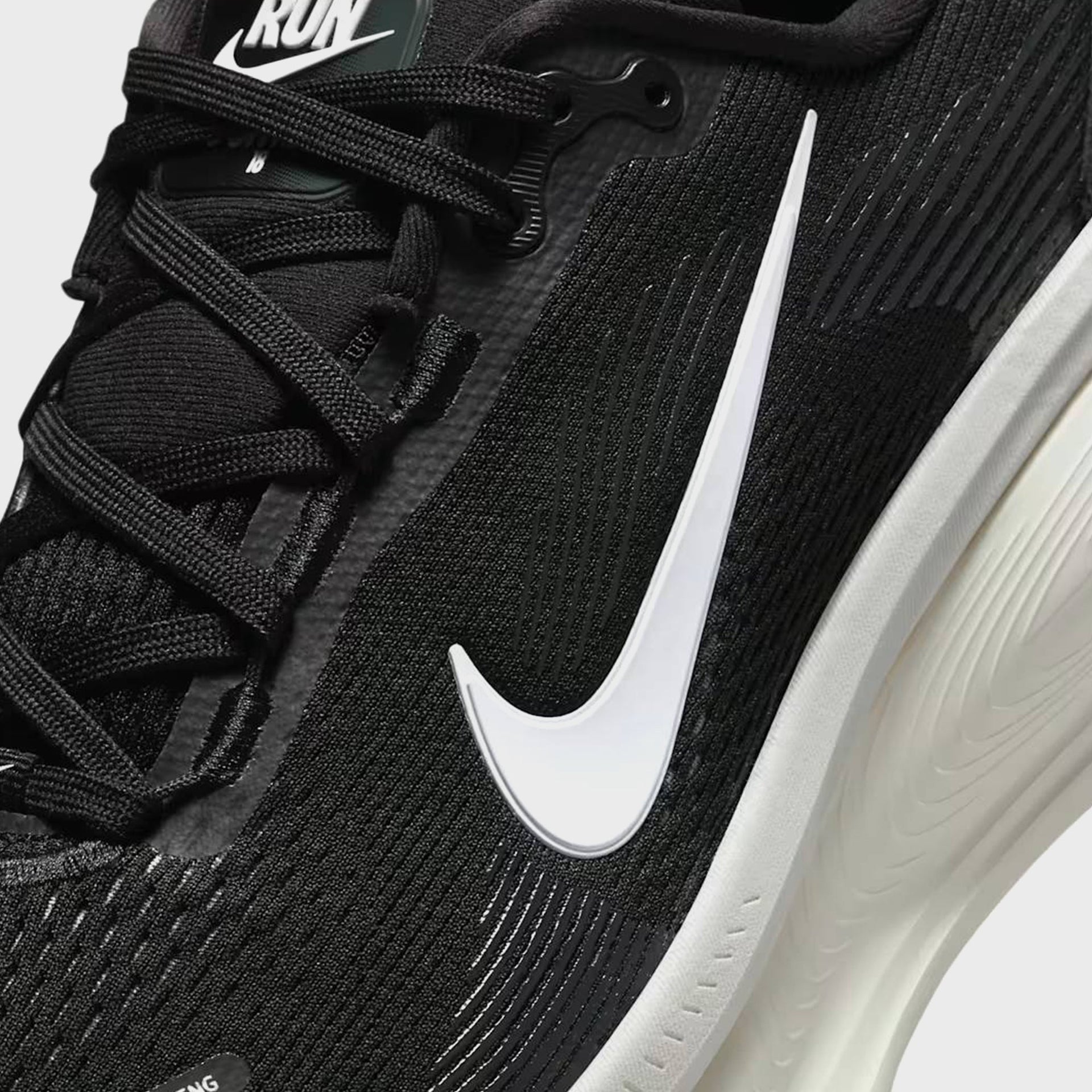 Nike Vomero 18 - Black / Coconut Milk / Light Iron Ore / Summit White