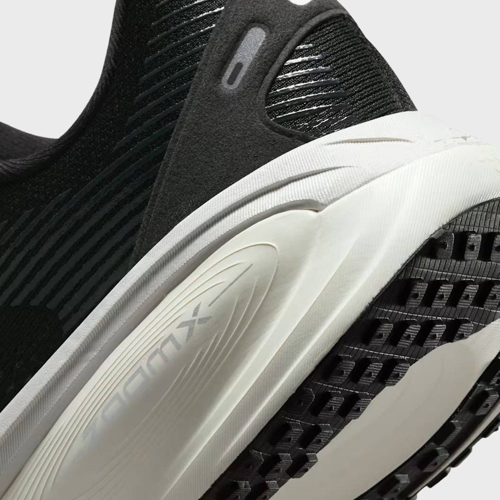 Nike Vomero 18 - Black / Coconut Milk / Light Iron Ore / Summit White