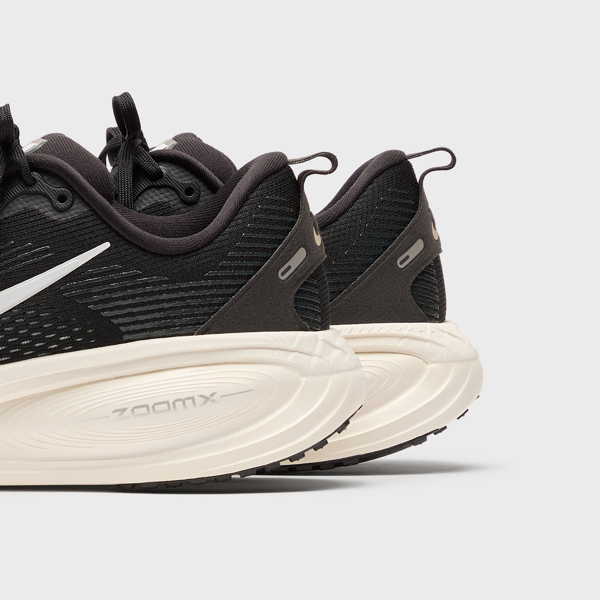 Nike Vomero 18 - Black / Coconut Milk / Light Iron Ore / Summit White