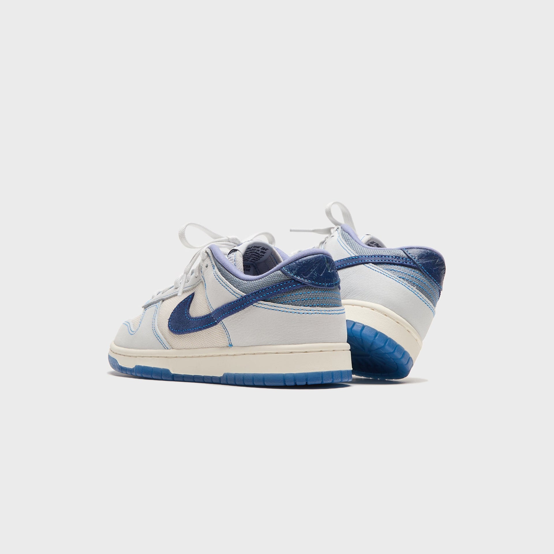 Nike Dunk Low Retro SE - Summit White / Blue Void / Pure Platinum