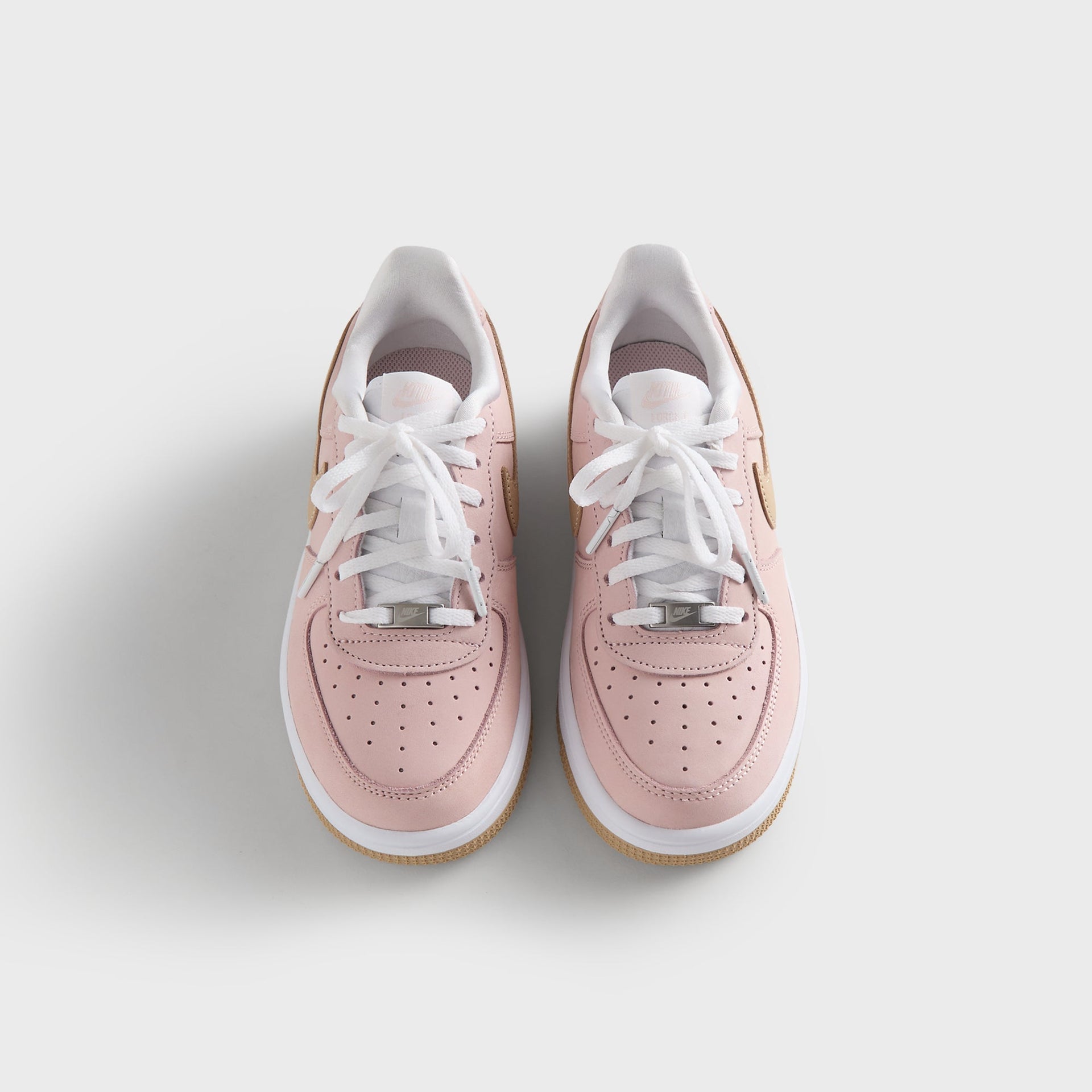 Kith Kids x Nike PS Air Force 1 Un-Linen pair from above, pink uppers, white laces and wheat suede Swoosh