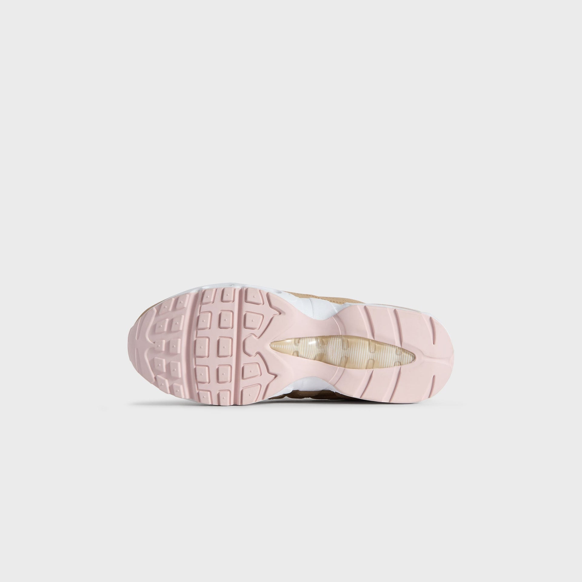 Translucent pink outsole of the Kith Kids x Nike GS Air Max 95 Linen, seen from below