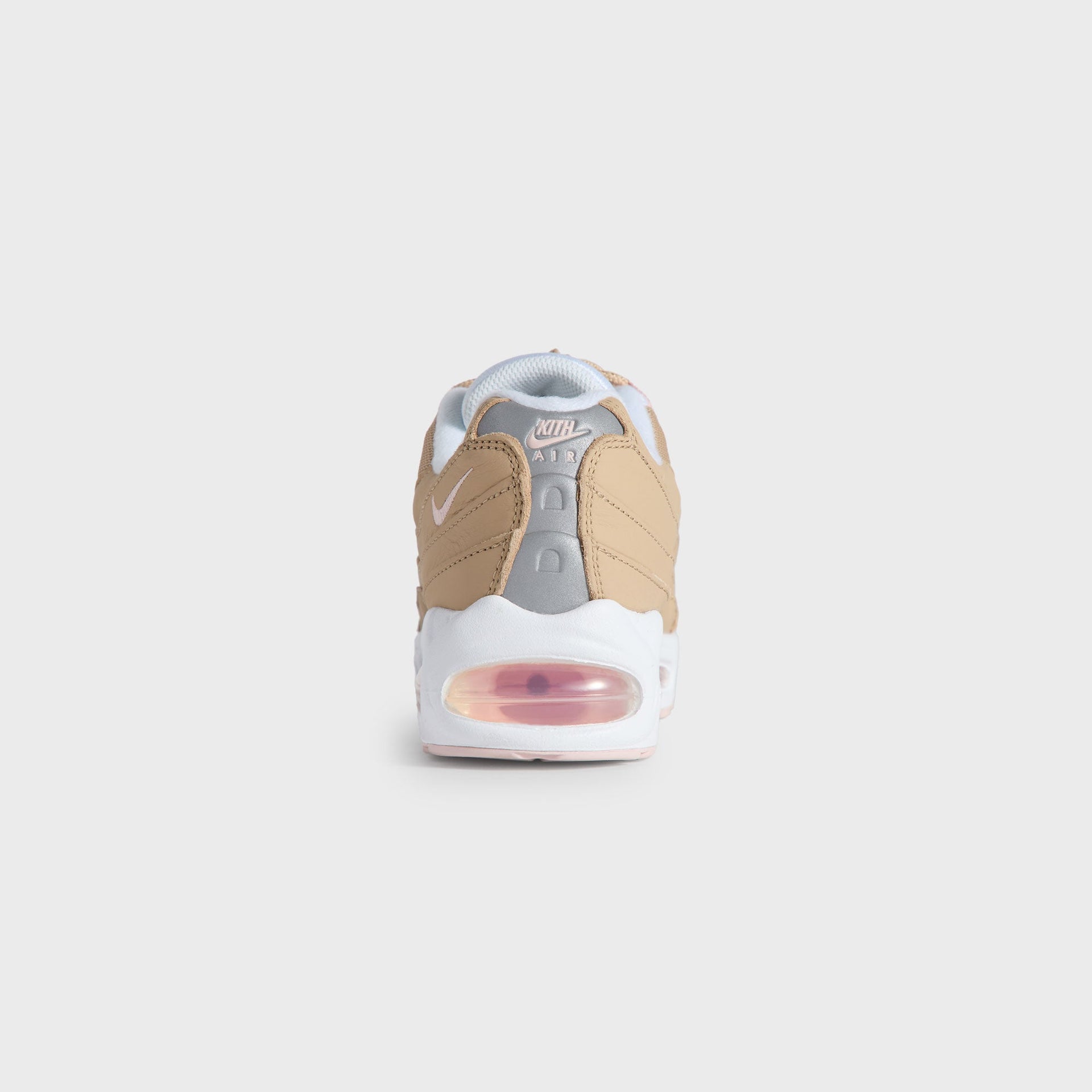 Heel view of the Kith Kids x Nike GS Air Max 95 Linen showing the pink Air Max unit