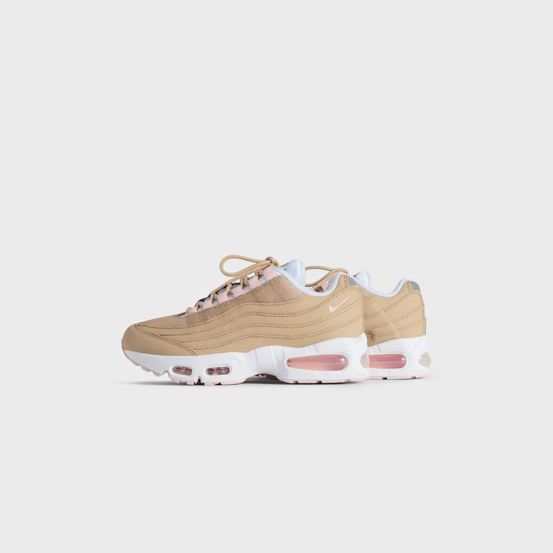 Kith Kids x Nike GS Air Max 95 Linen pair, small front three-quarter angle in wheat linen with pink