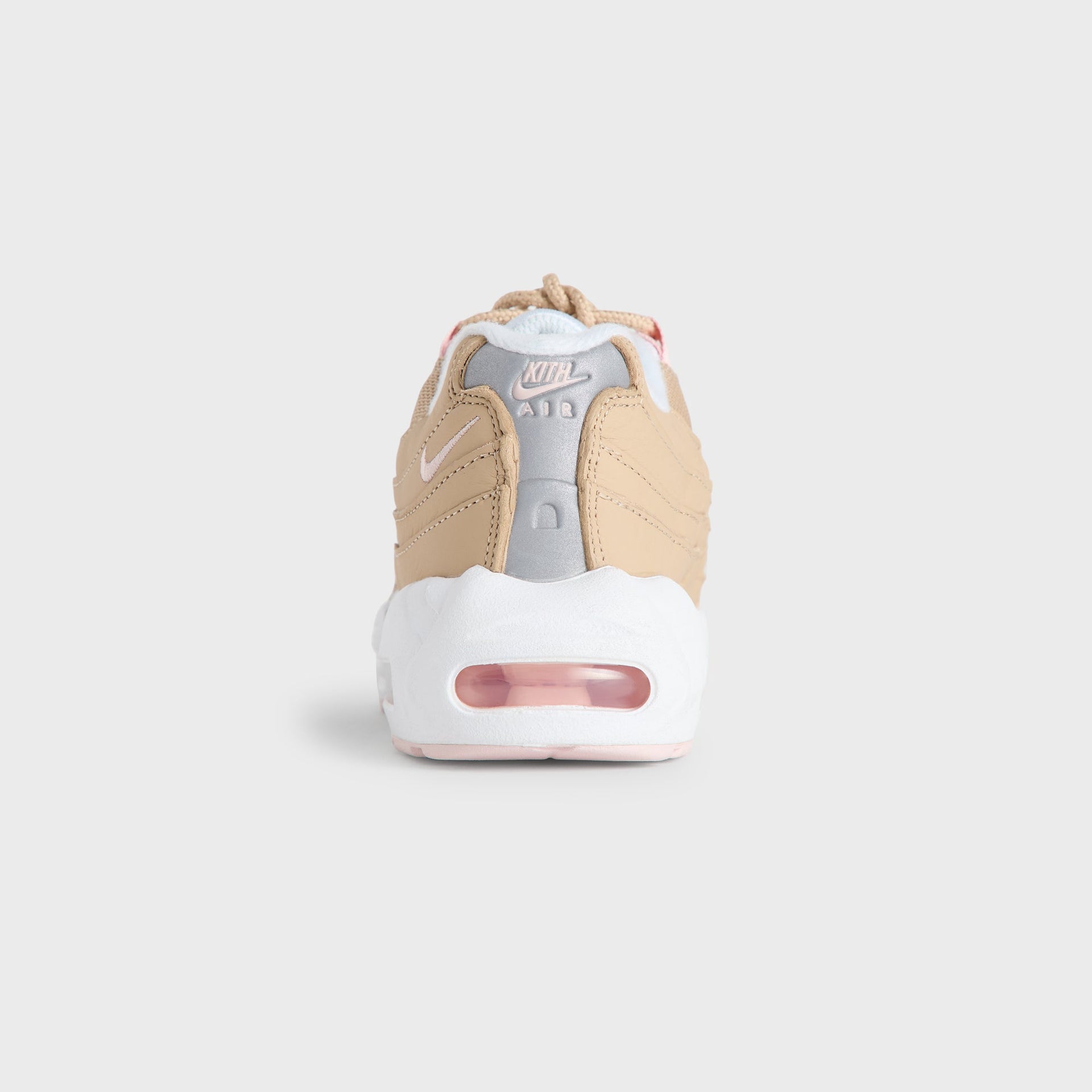 Heel view of the Kith Kids x Nike PS Air Max 95 Linen showing the pink Air Max unit