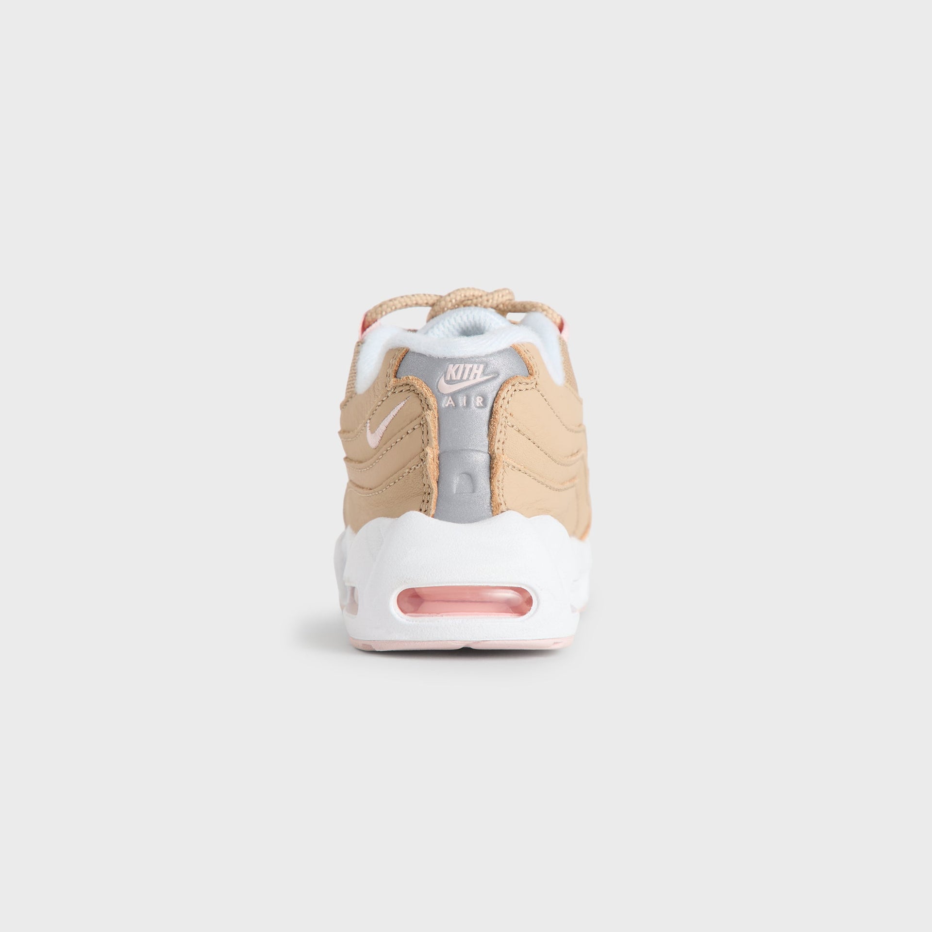 Heel view of the Kith Kids x Nike TD Air Max 95 Linen showing the pink Air Max unit