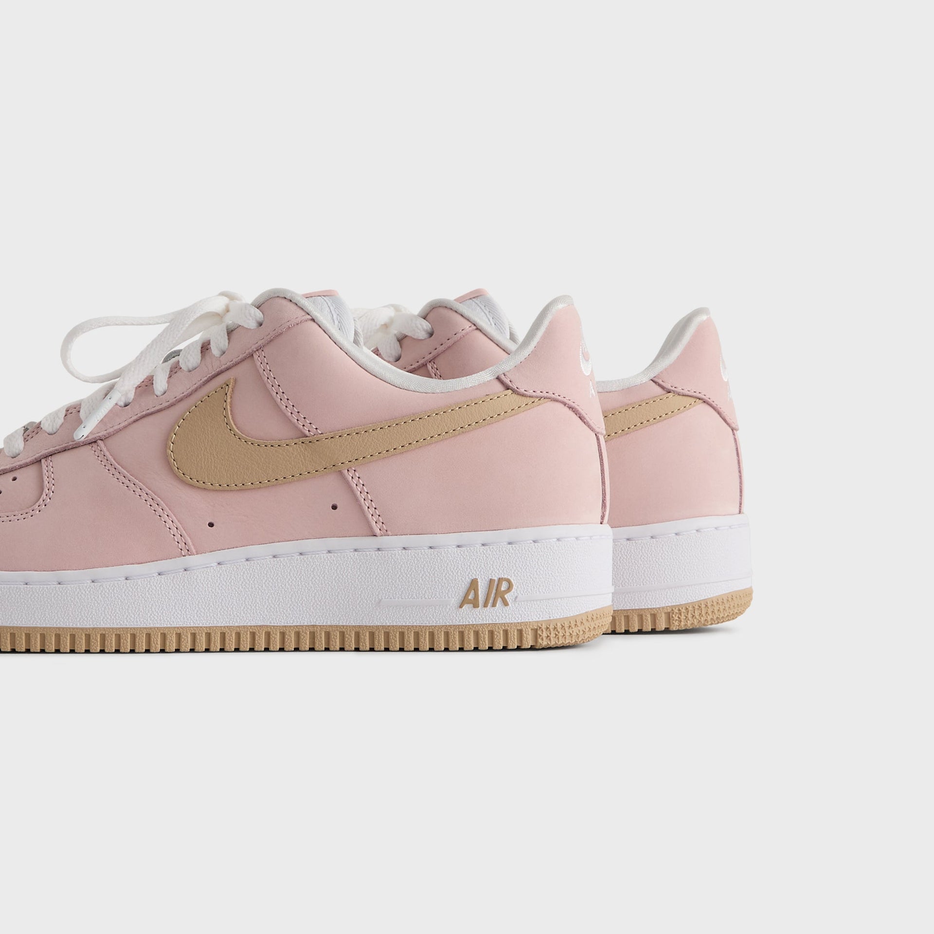 Kith for Nike Air Force 1 'Un-Linen' rear three-quarter close-up with gold Air text and gum sole edge