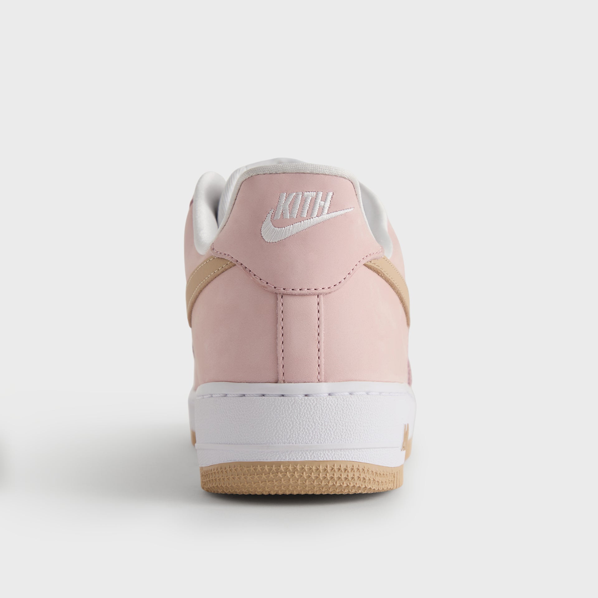 Heel of the Kith x Nike Air Force 1 Un-Linen in pink suede with a woven Kith heel tab