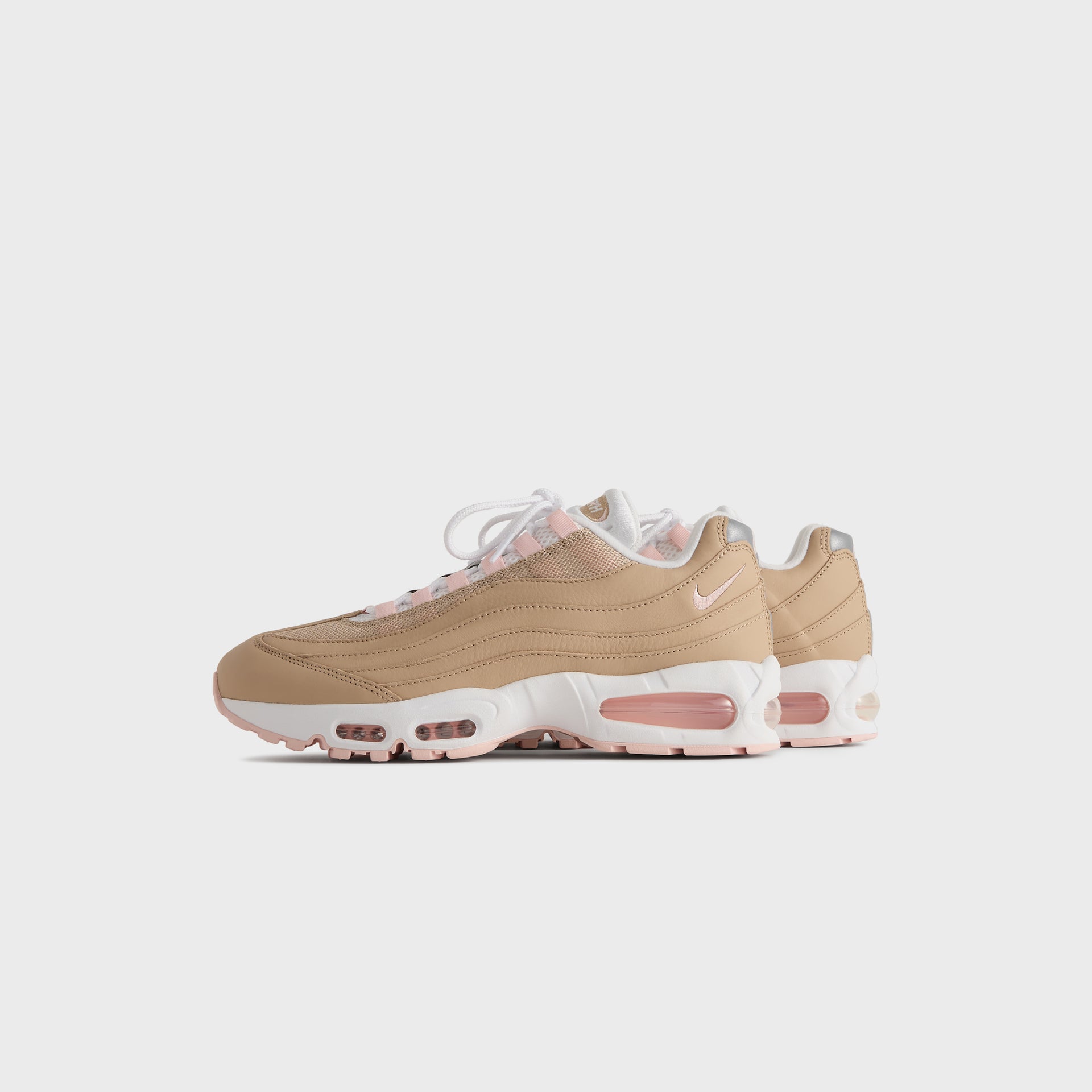 Kith x Nike Air Max 95 Linen pair, small front three-quarter angle in wheat linen