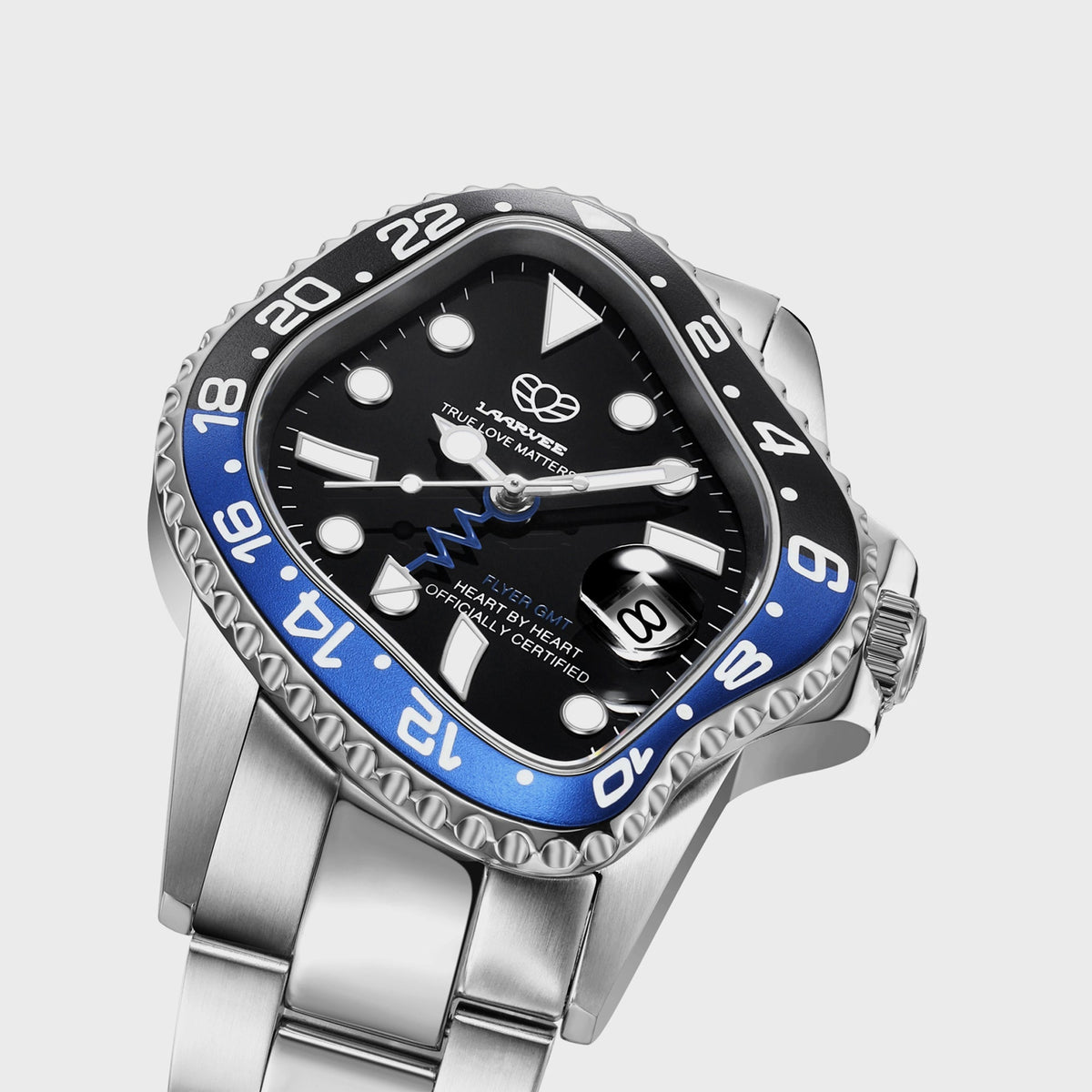 LAARVEE Silver Precision Steel watch with black and blue GMT bezel and black dial, close-up angled dial view