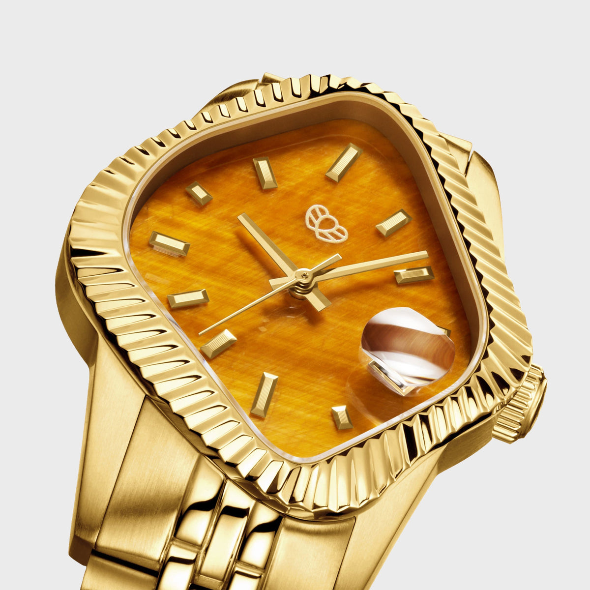 LAARVEE Golden Precision Steel watch with fluted bezel and tiger's eye dial, close-up angled dial view