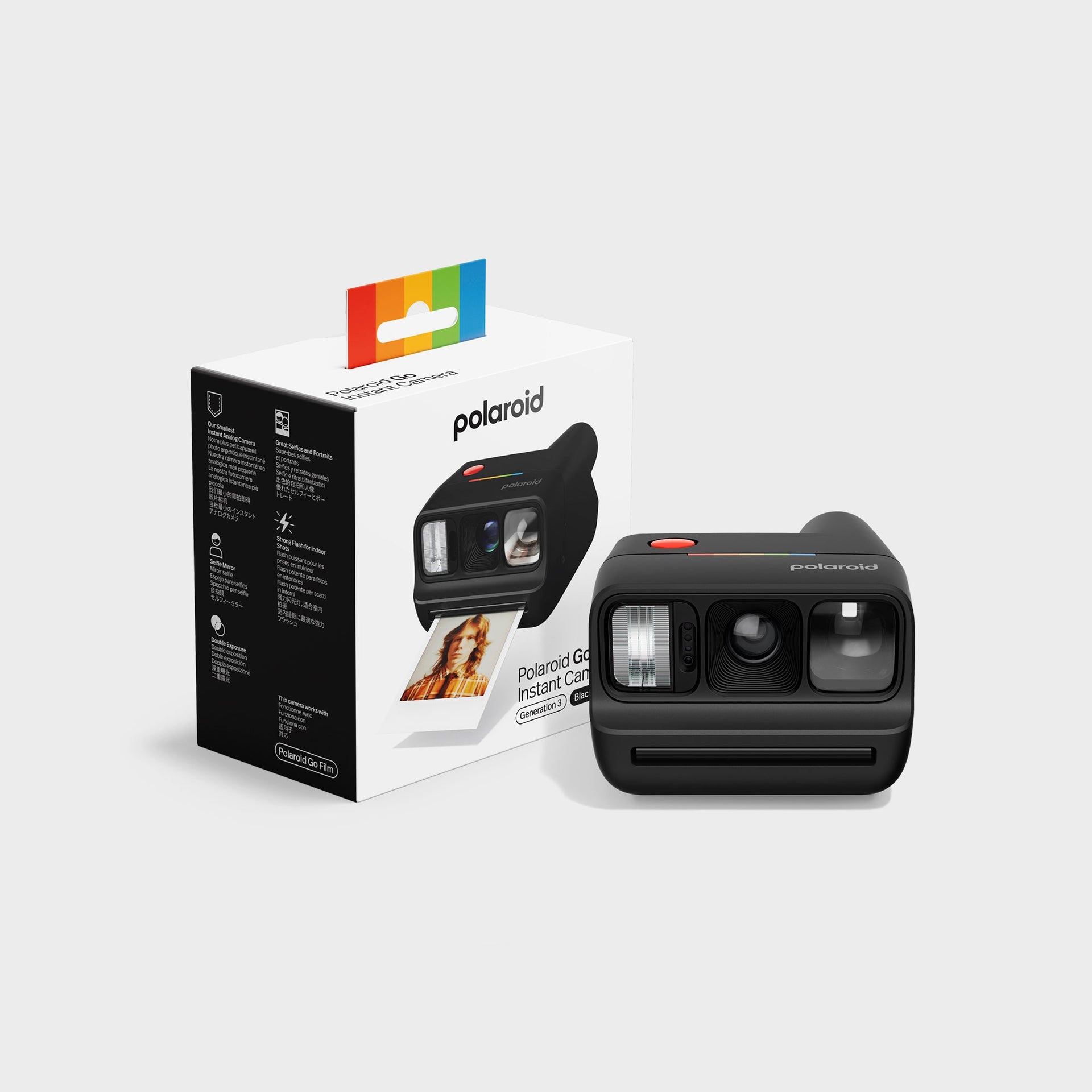 Polaroid Go Gen 3 black camera beside its retail box printed with feature icons and a sample instant photo