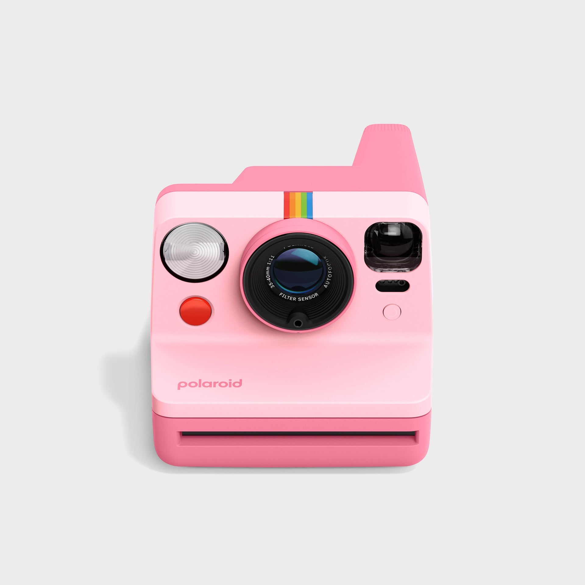 Polaroid Now Generation 3 camera in pink, front view with round flash, autofocus lens, red shutter and rainbow stripe
