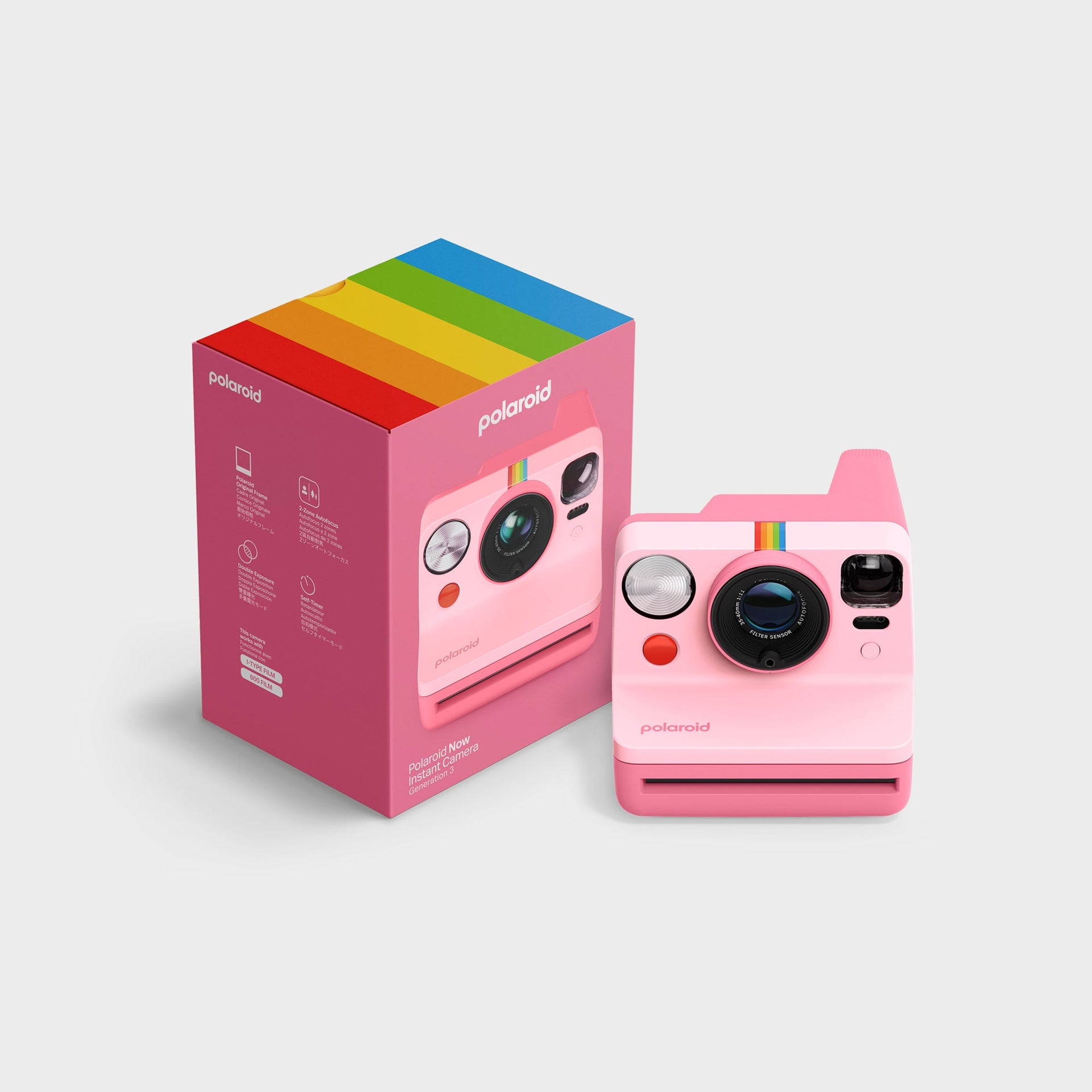 Polaroid Now Gen 3 pink camera beside its pink rainbow-topped retail box printed with feature icons