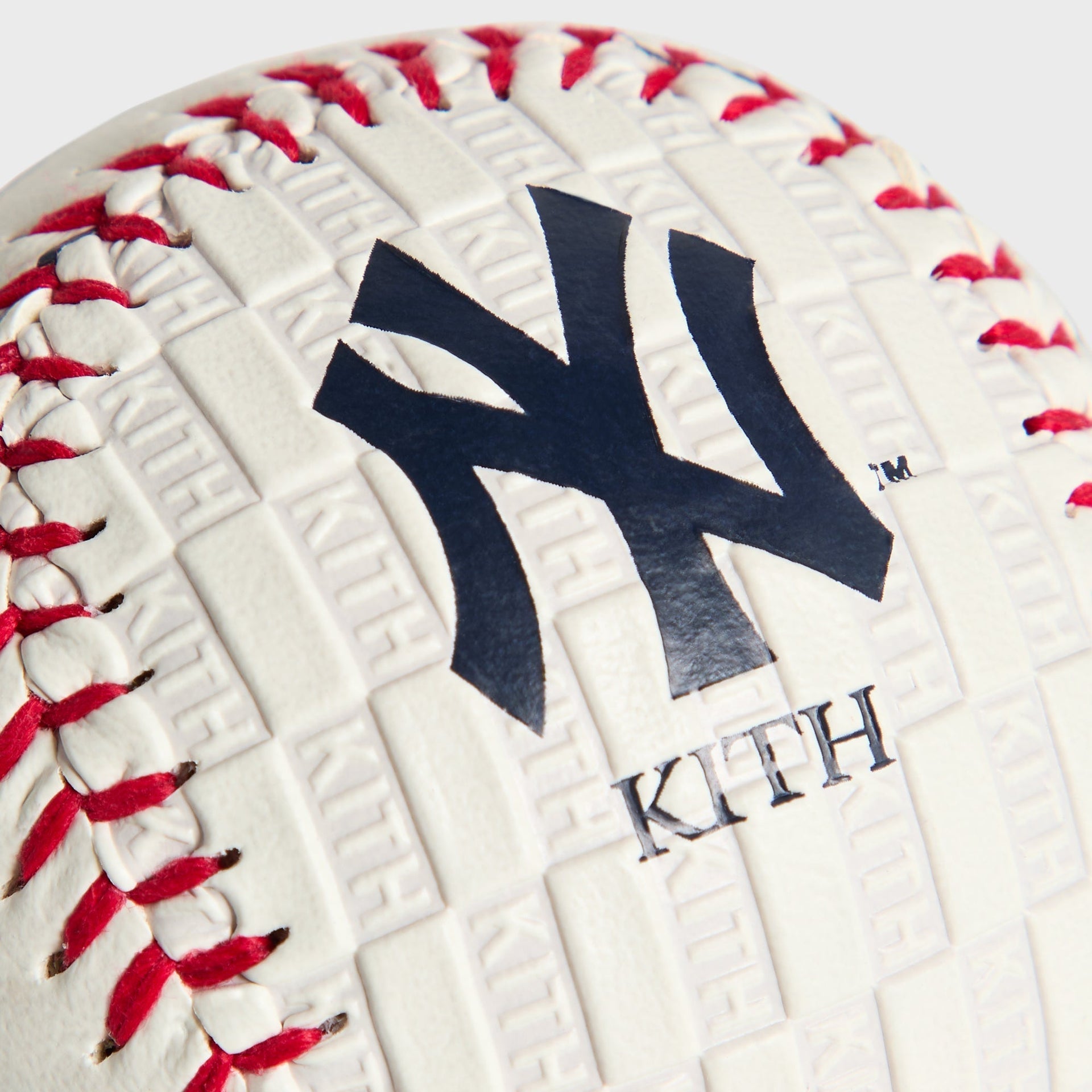 Kith & Rawlings Commemorative Baseball - close-up detail of embossed NY logo and Kith wordmark