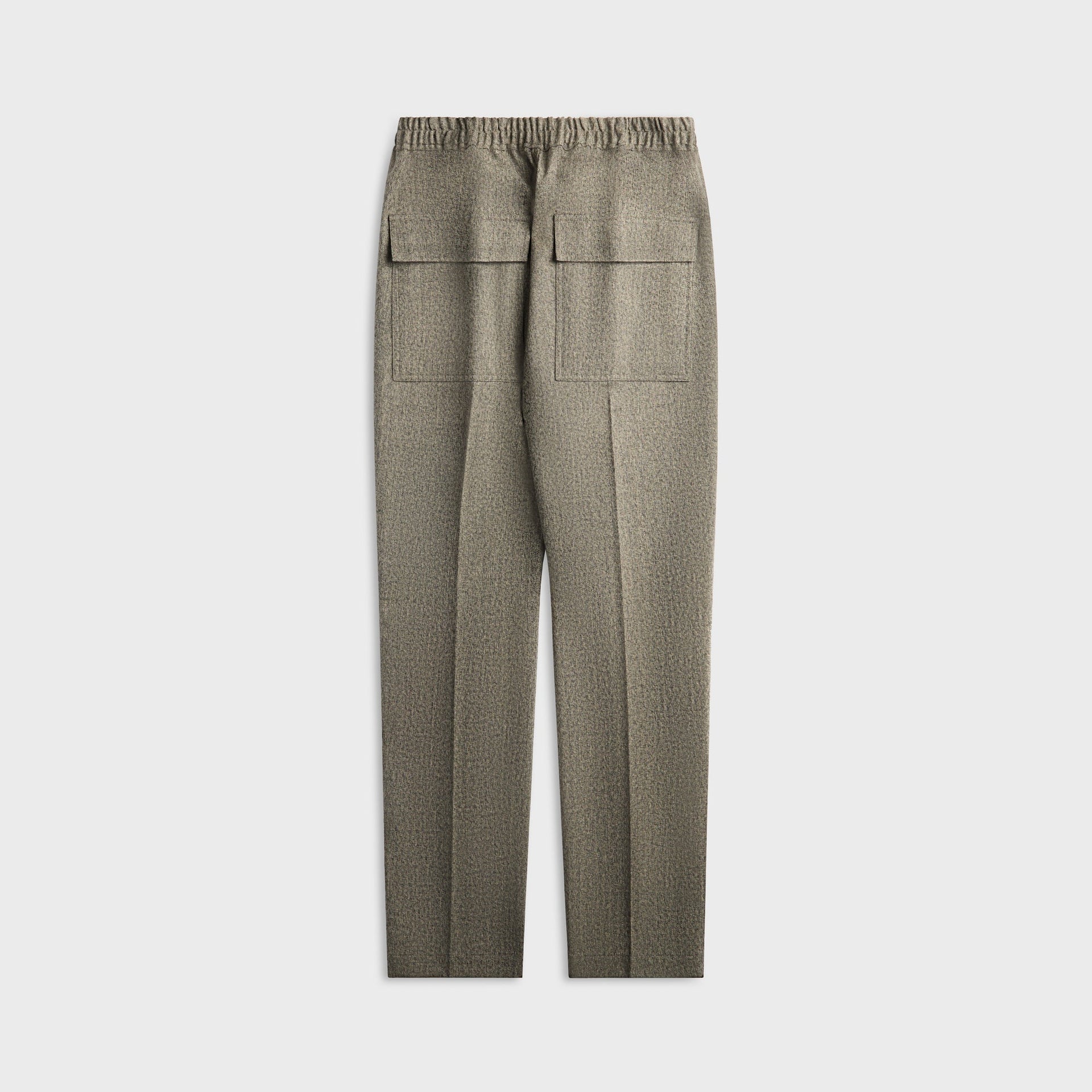 Stone Island indigo jeans, back view, patch pockets and leather logo tab on waistband
