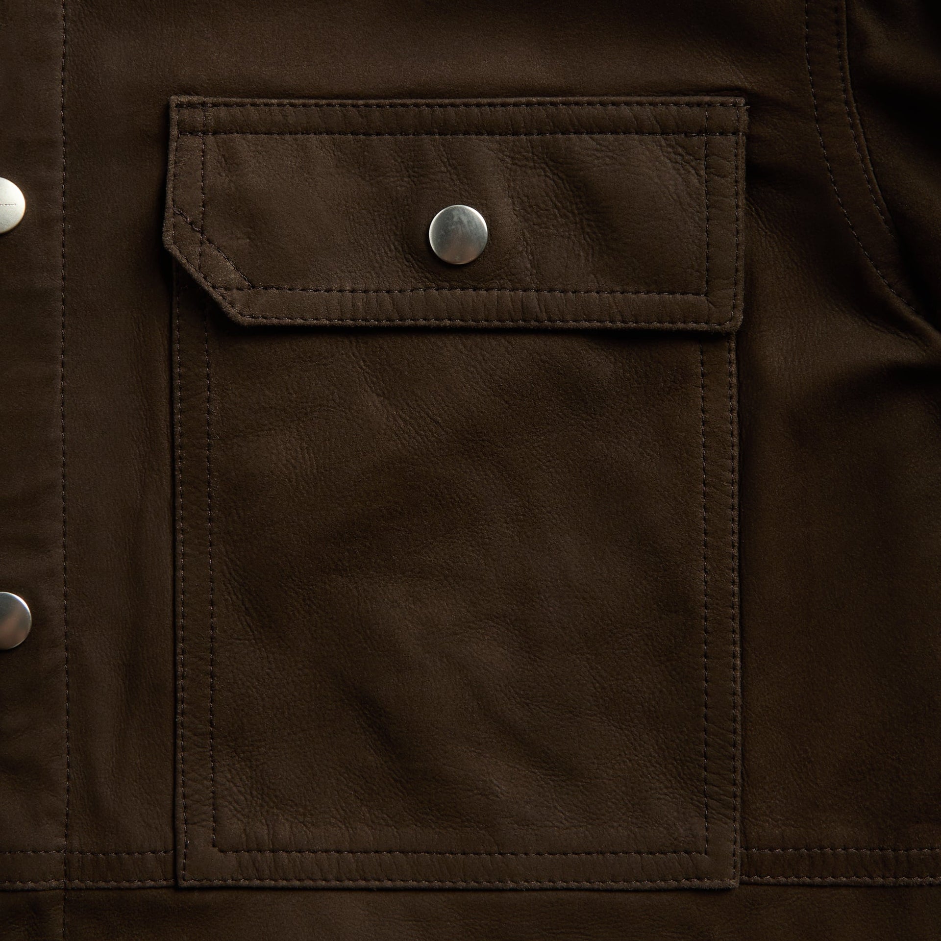 Stone Island jacket detail, black zip hand pocket with pink pull on coated pink nylon
