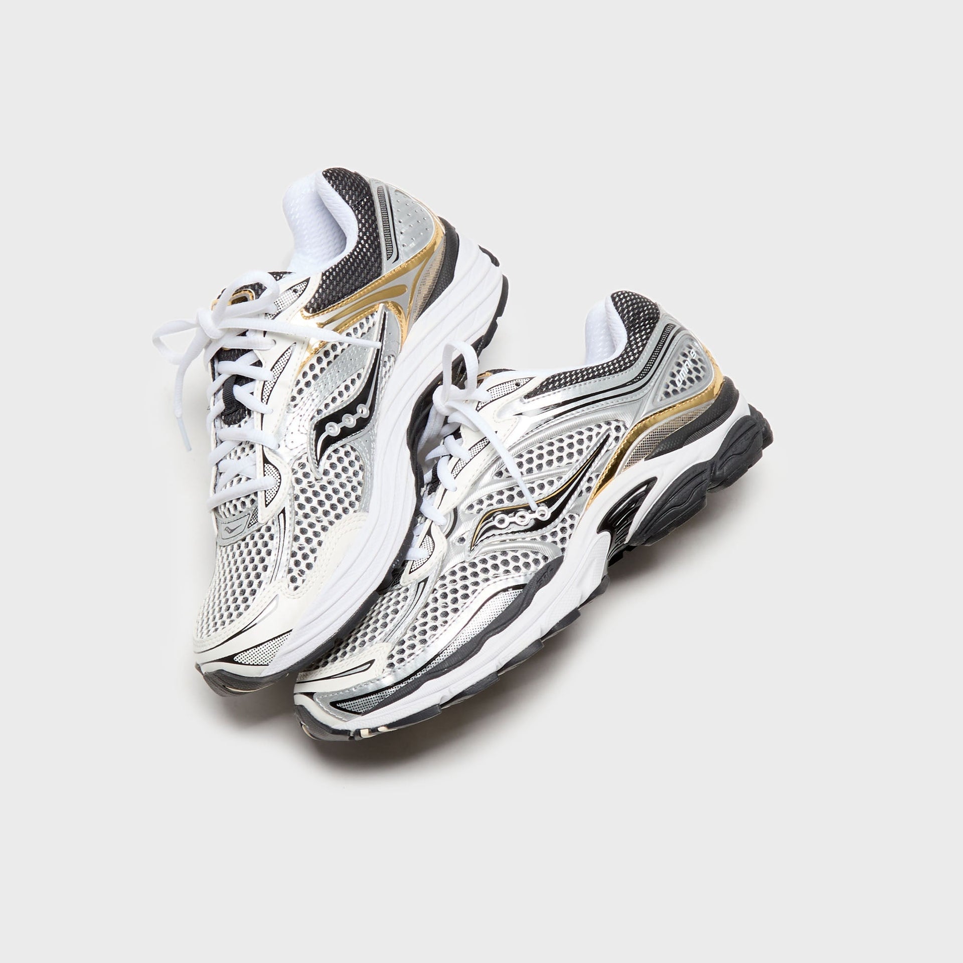 Saucony ProGrid Omni 9 - Silver / Gold