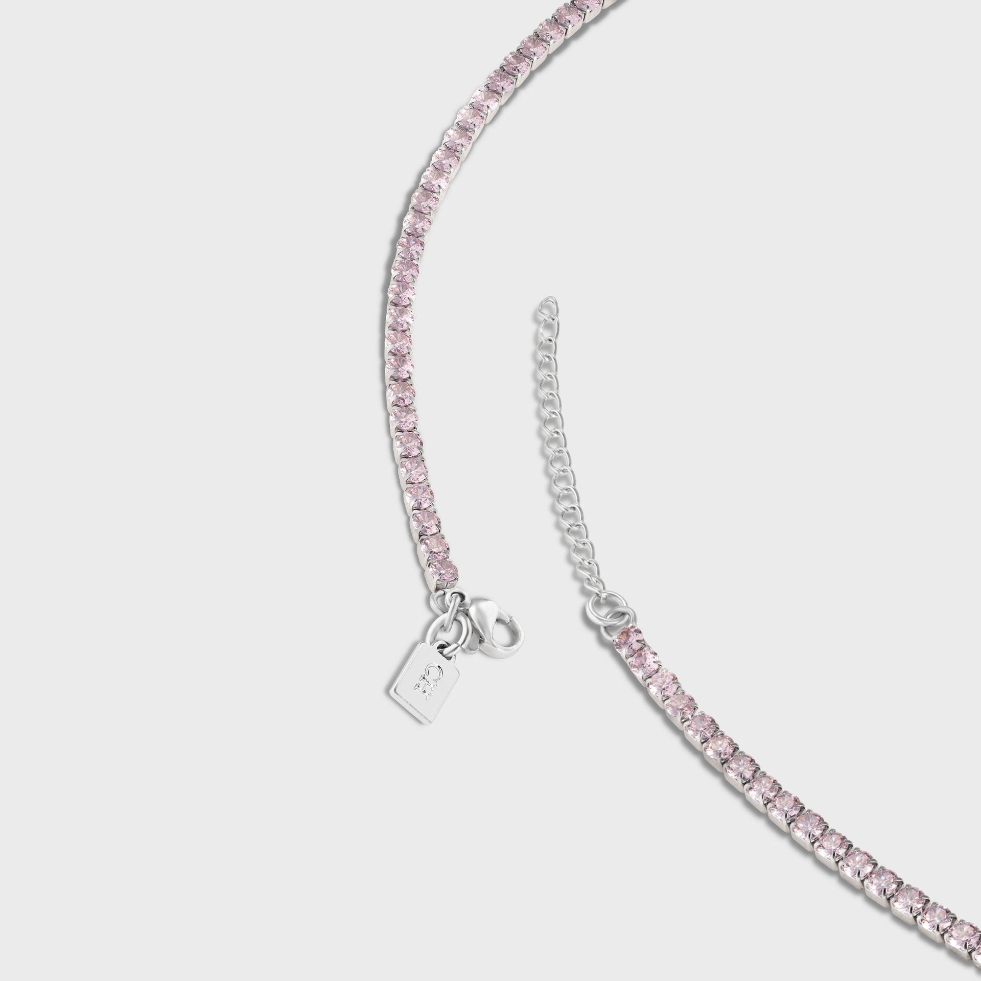 Crystal Haze Serena anklet, close-up of clasp, extender chain and CH logo tag with pink crystals