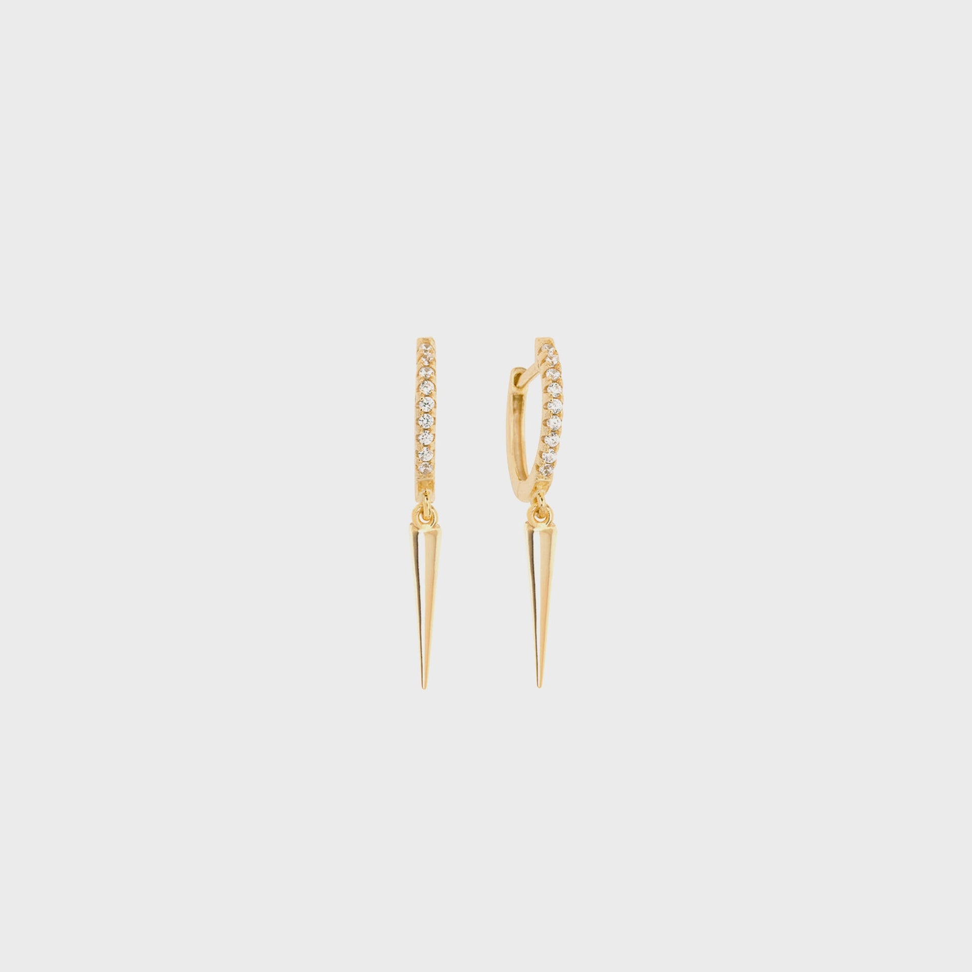 SHASHI Dagger Huggie in Yellow Gold
