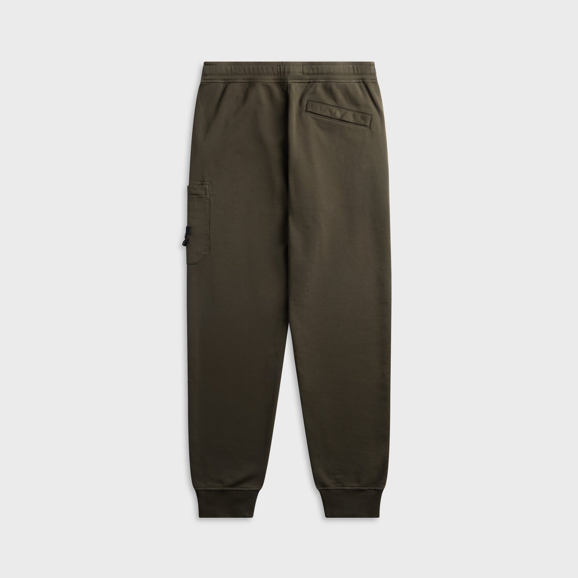 Stone Island fleece sweatpants in dark olive, back view with welt pocket and cuffed ankles