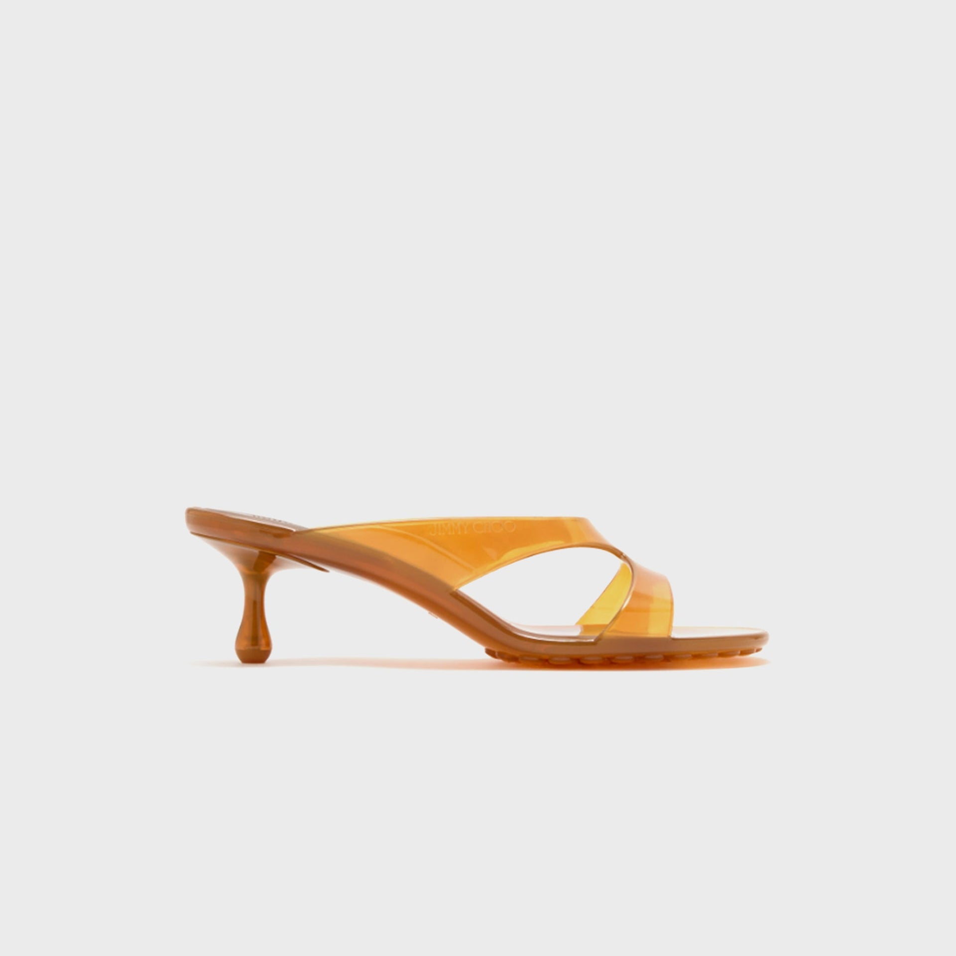 Jimmy Choo Jelly Drop 50 mule sandal in translucent amber jelly with kitten heel, lateral view